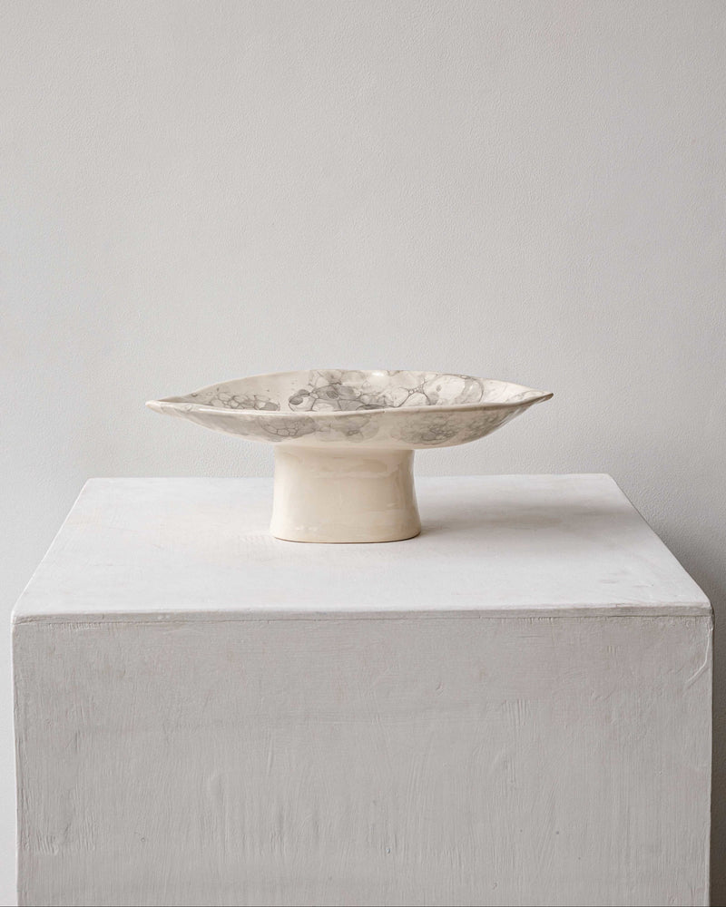 Dyka ceramic centerpiece bowl with floral motifs on pedestal base