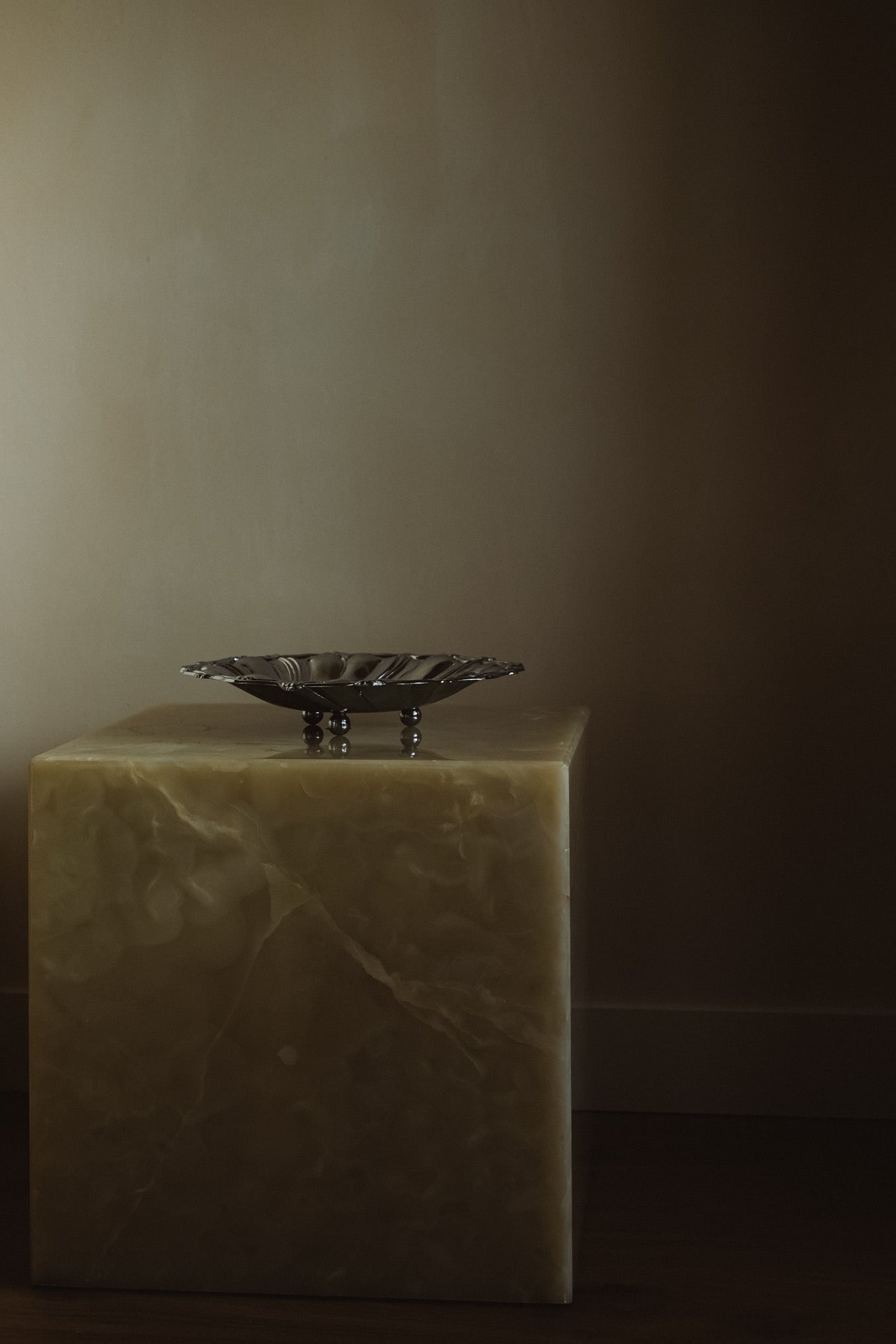Italian Decorative Bowl — positioned on a translucent stone pedestal