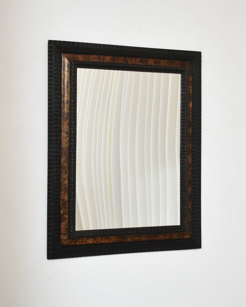 Carved ebonised wood mirror and trompe l'oeil turshell, XIXth c. — detail view