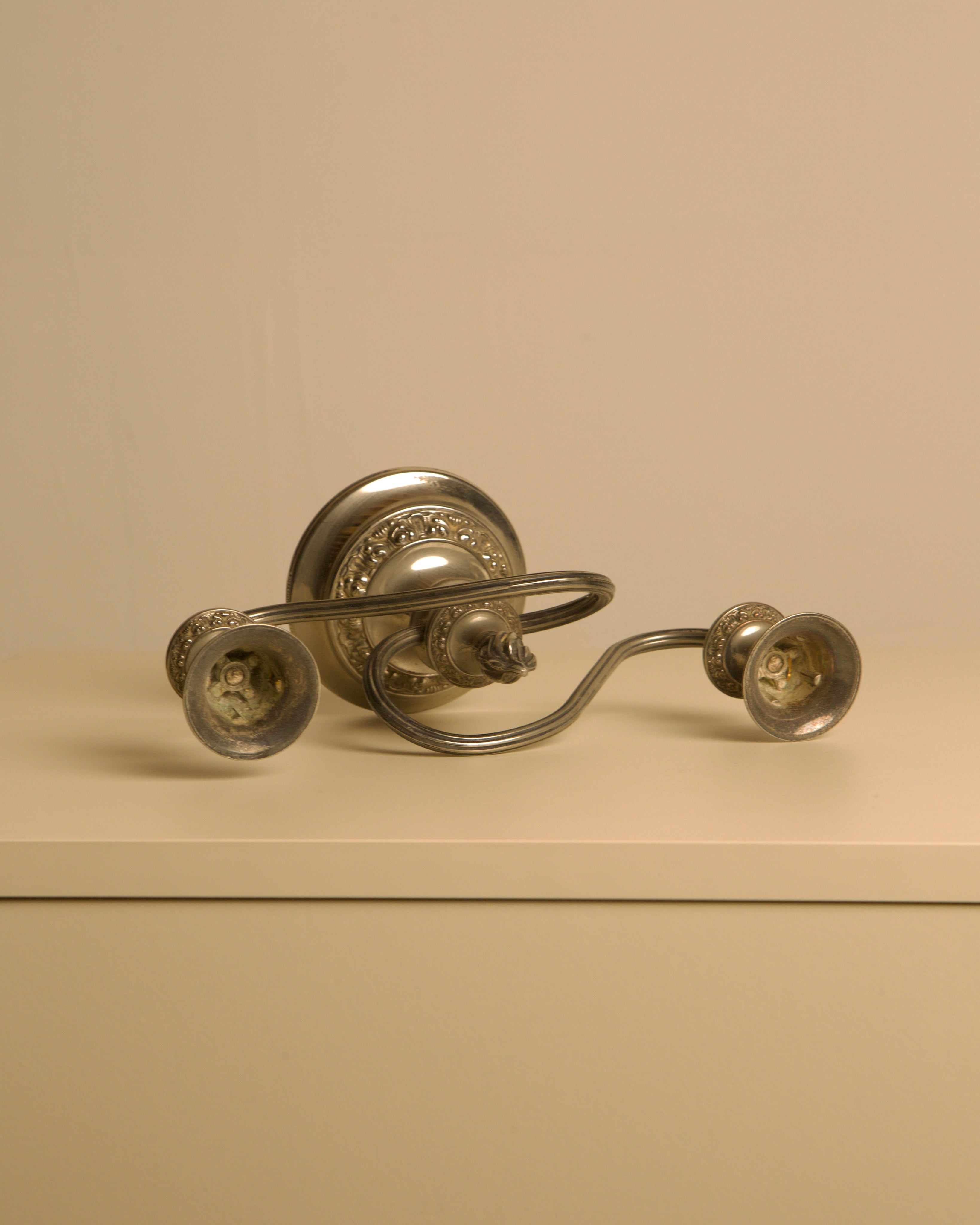Italian Art Deco Metal Candleholders, 1930s — top view on neutral background