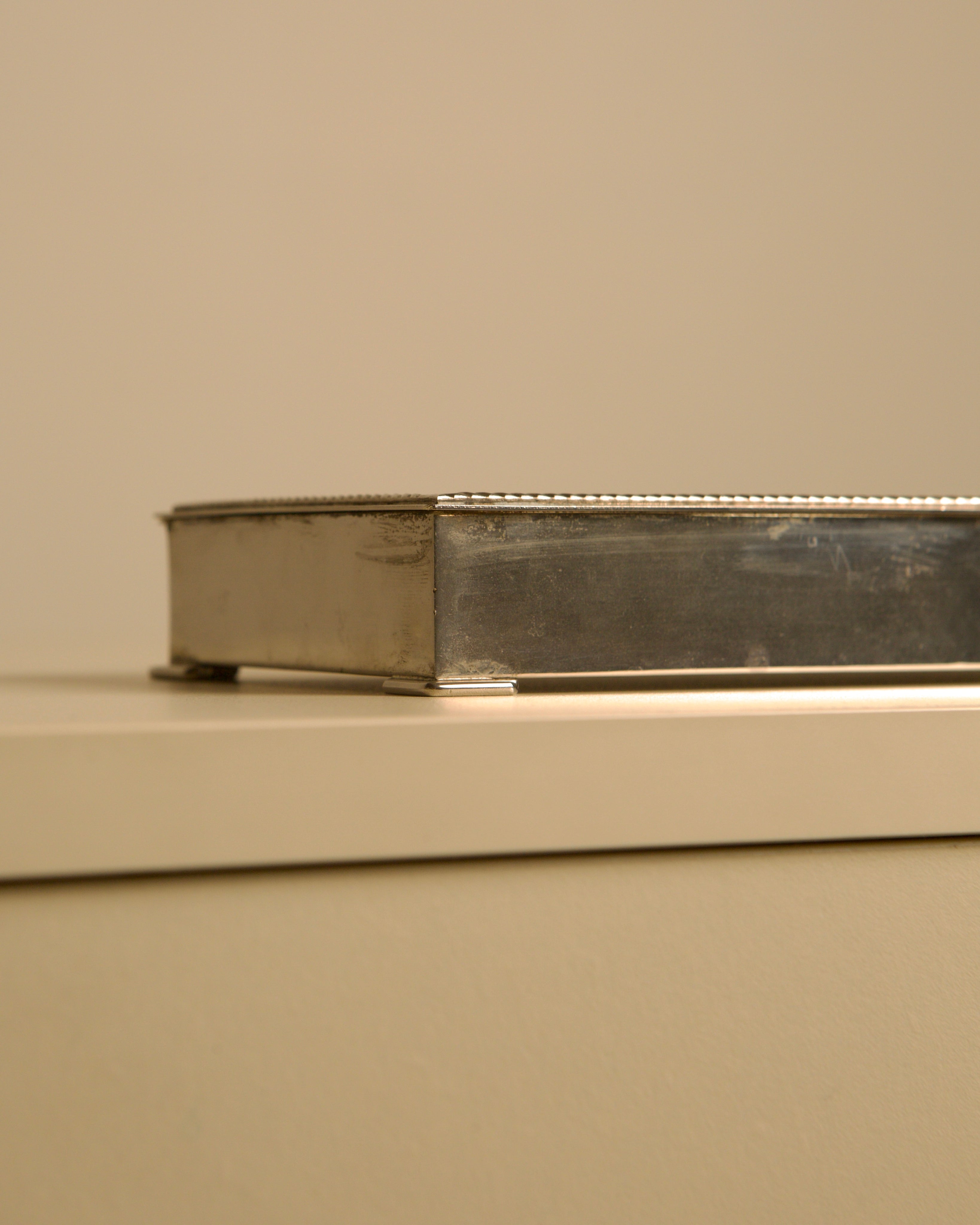 Italian Art Deco silver-plated metal and wood rectangular box, 1930s — side angle