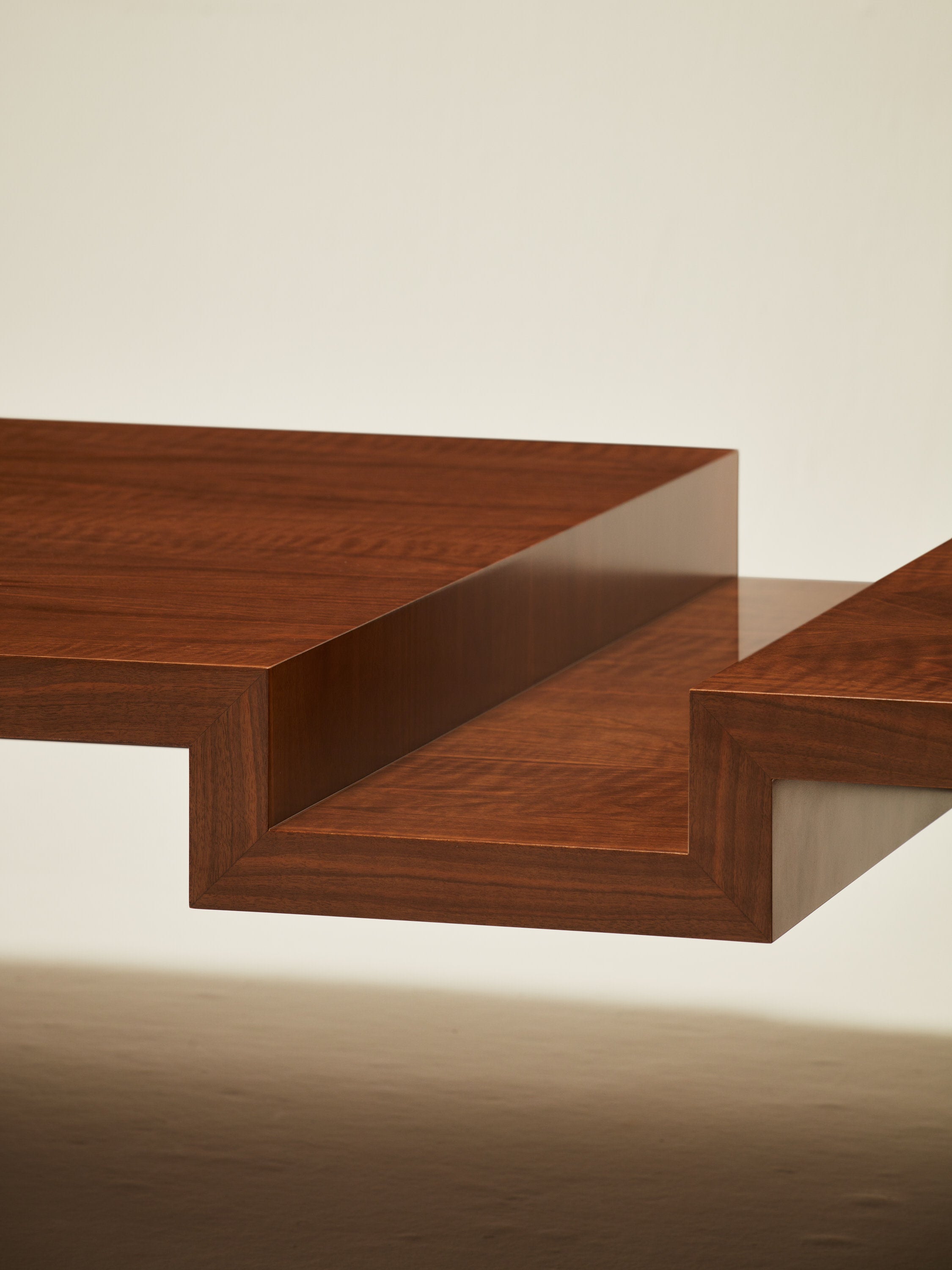 'Continuous' Coffee Table I Handcrafted in Wood Veneer — side angle