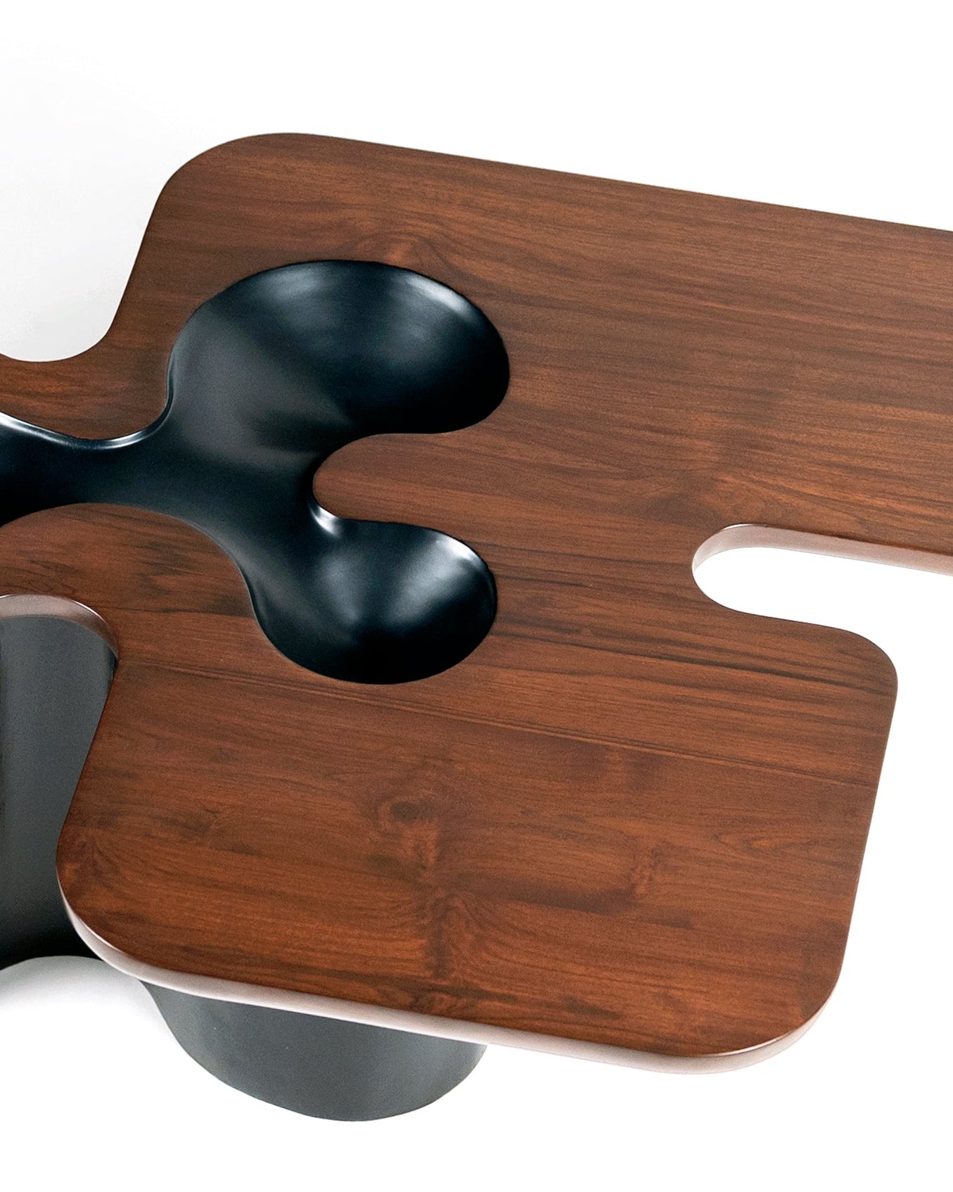 Canyon Centre Table — top view of walnut surface with black accents