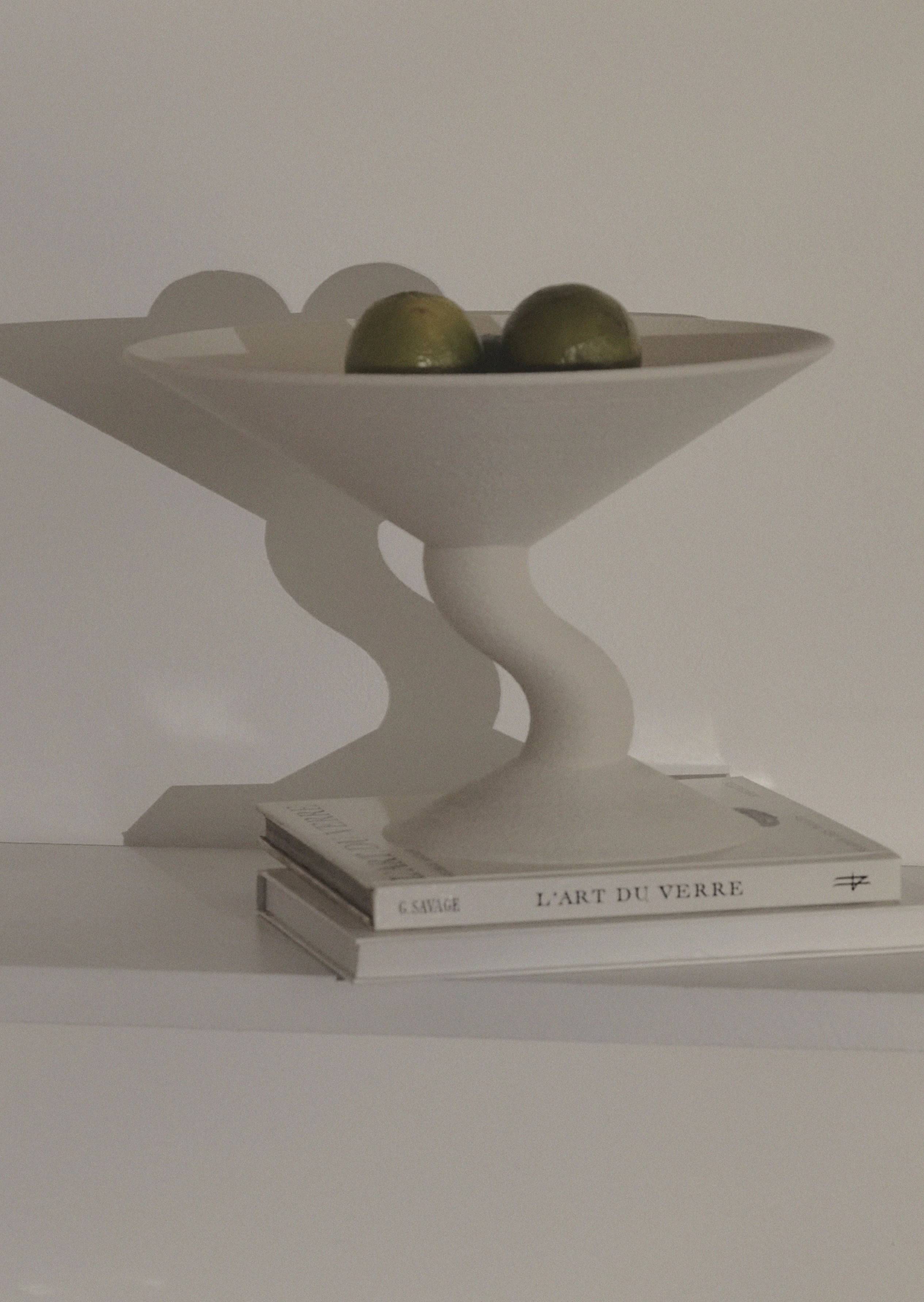 Wavy Fruit Stand — top view with white ceramic and green limes