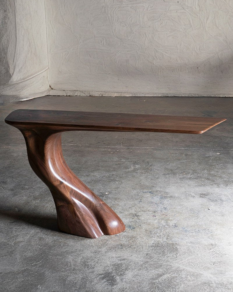 Frolic Wall Mounted Console in Walnut wood Natural Stain — close-up of curved wooden leg
