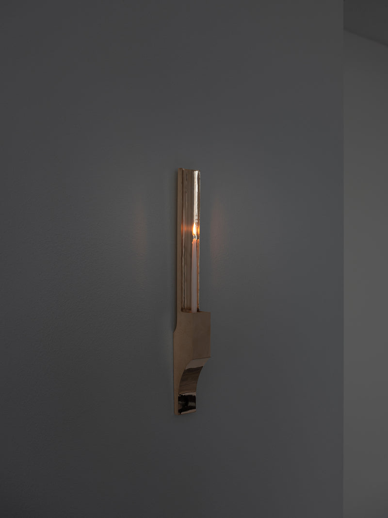 Case obj.8 - Candleholder Wall Piece — close-up of brass candleholder on wall