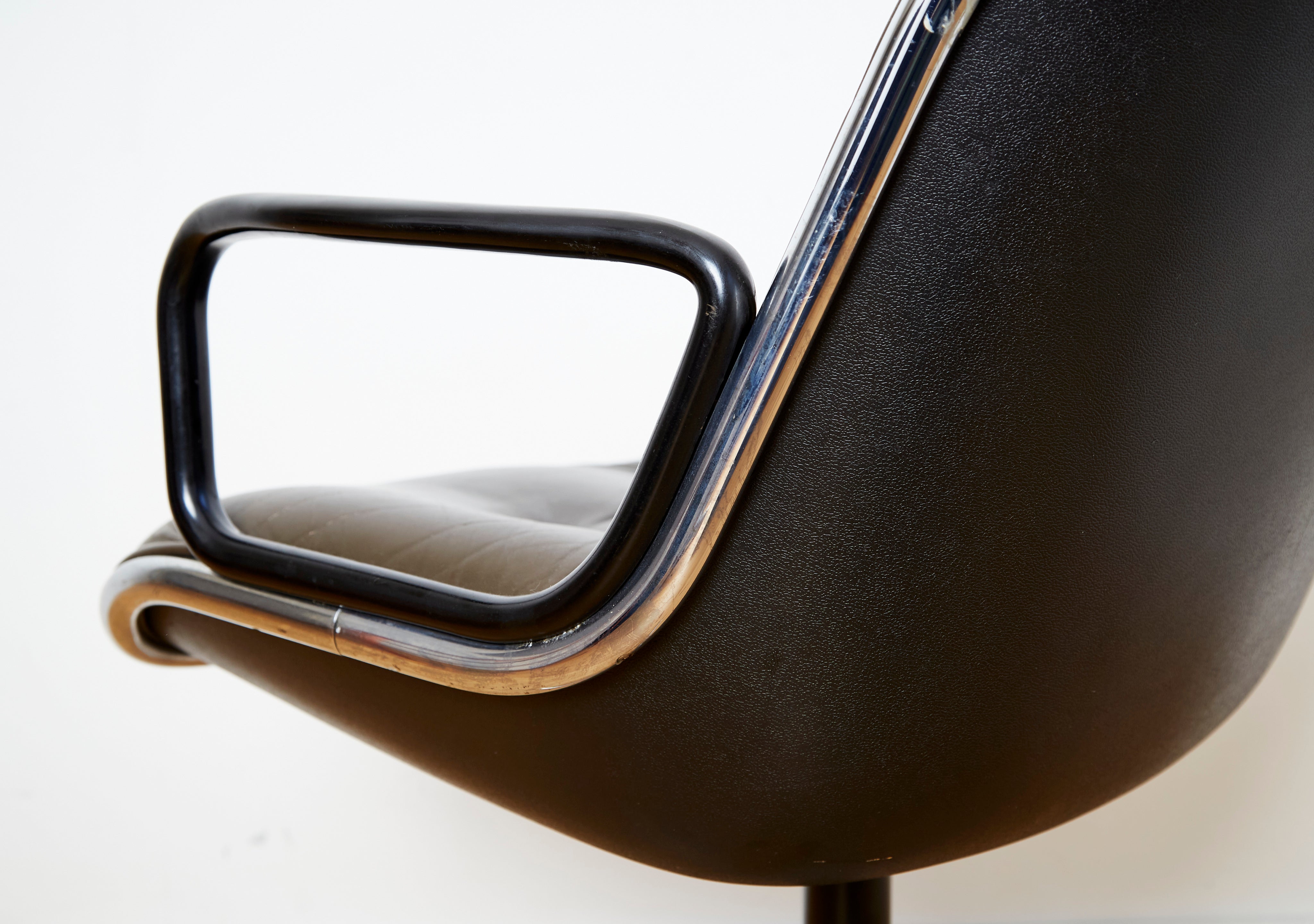 Charles Pollock "Executive Chair" for Knoll International — back view showing black leather and chrome armrest