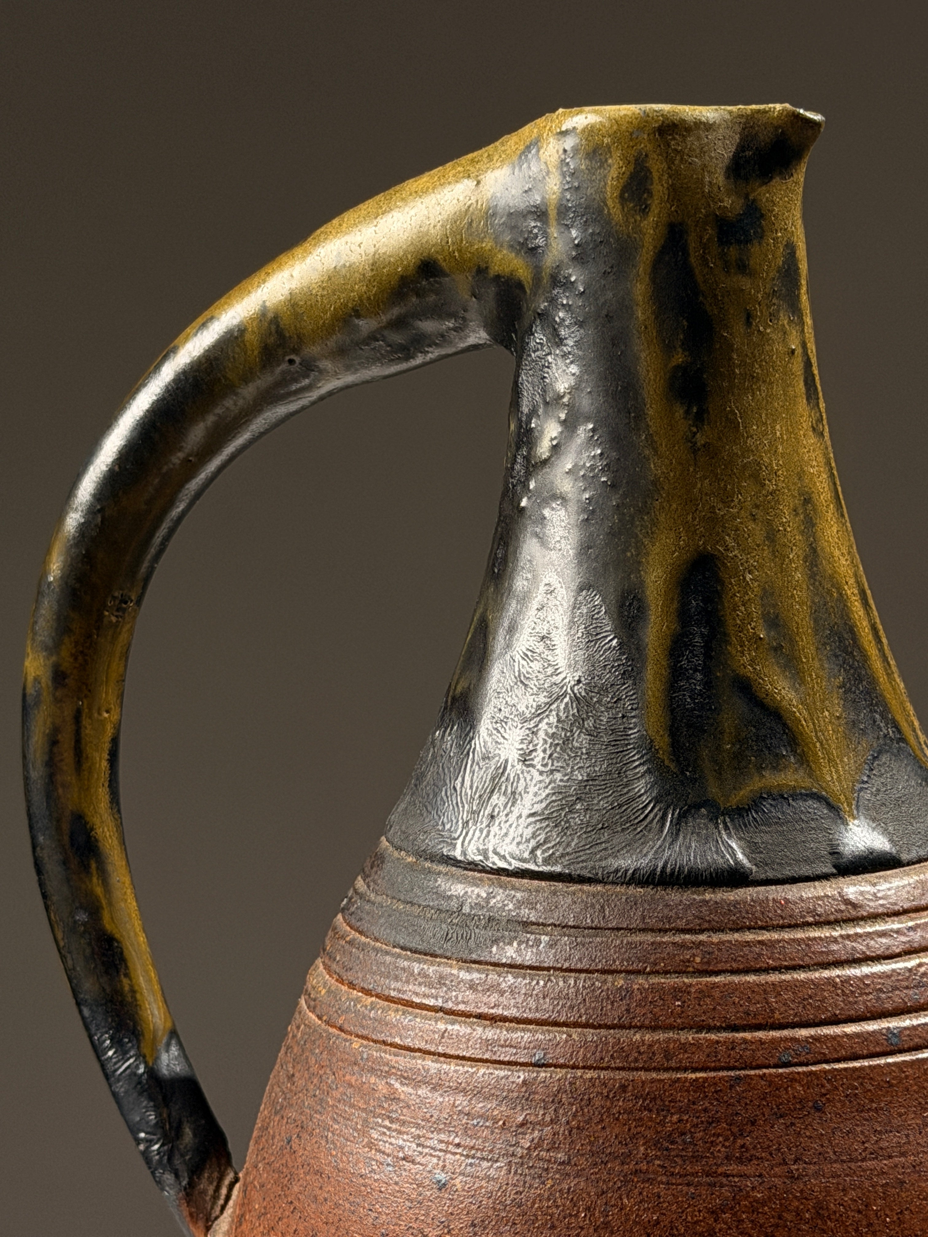 Large sculptural glazed stoneware pitcher, circa 1970 — detail view