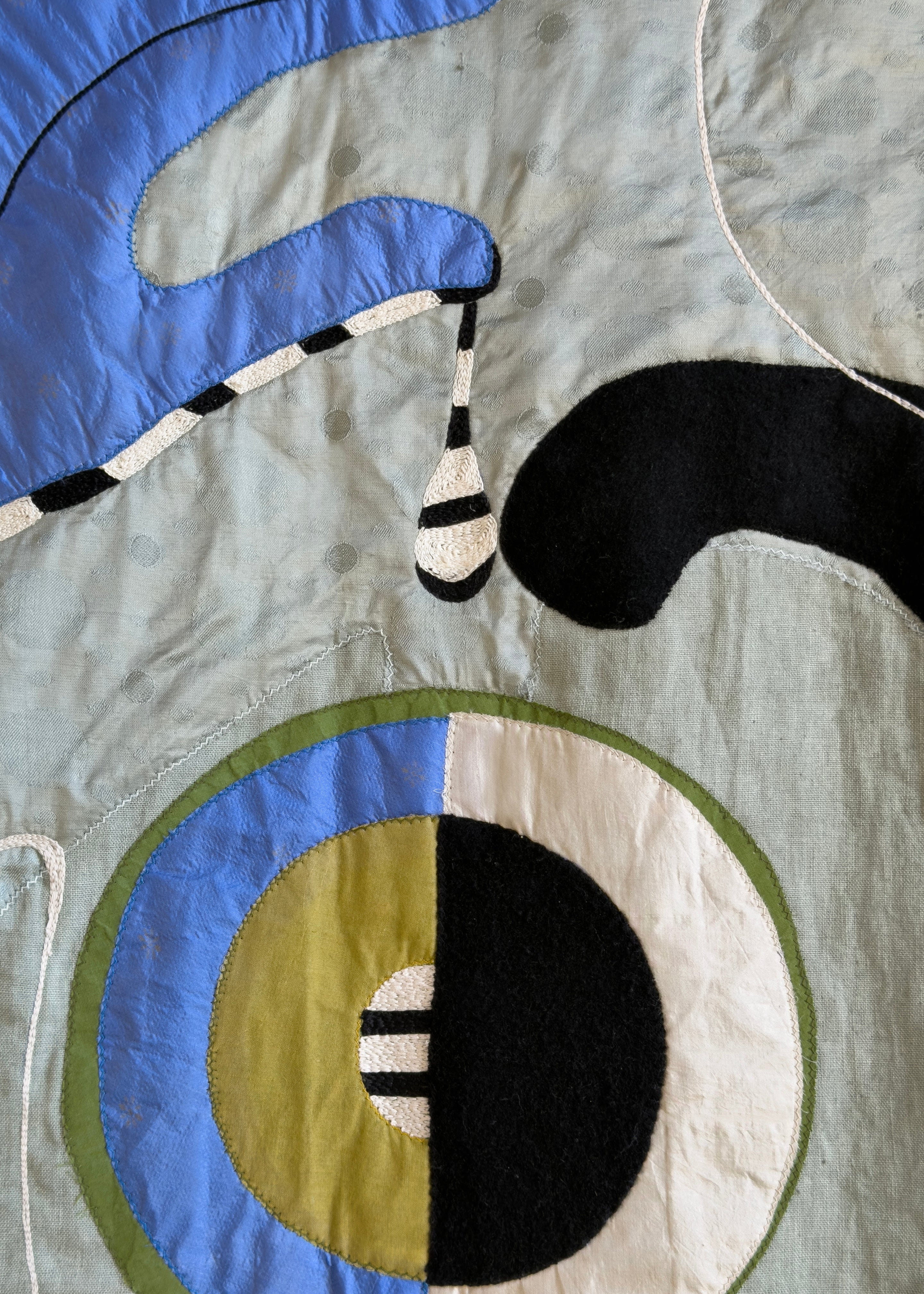 Languid Parts Tapestry — side angle highlighting colorful fabric details