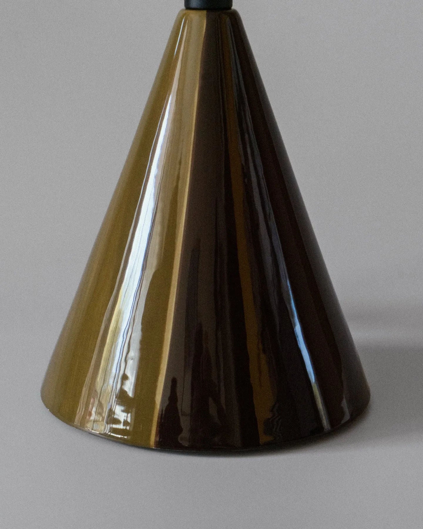 Caterina" Table Lamp - Golden Olive — close-up of conical base in modern setting