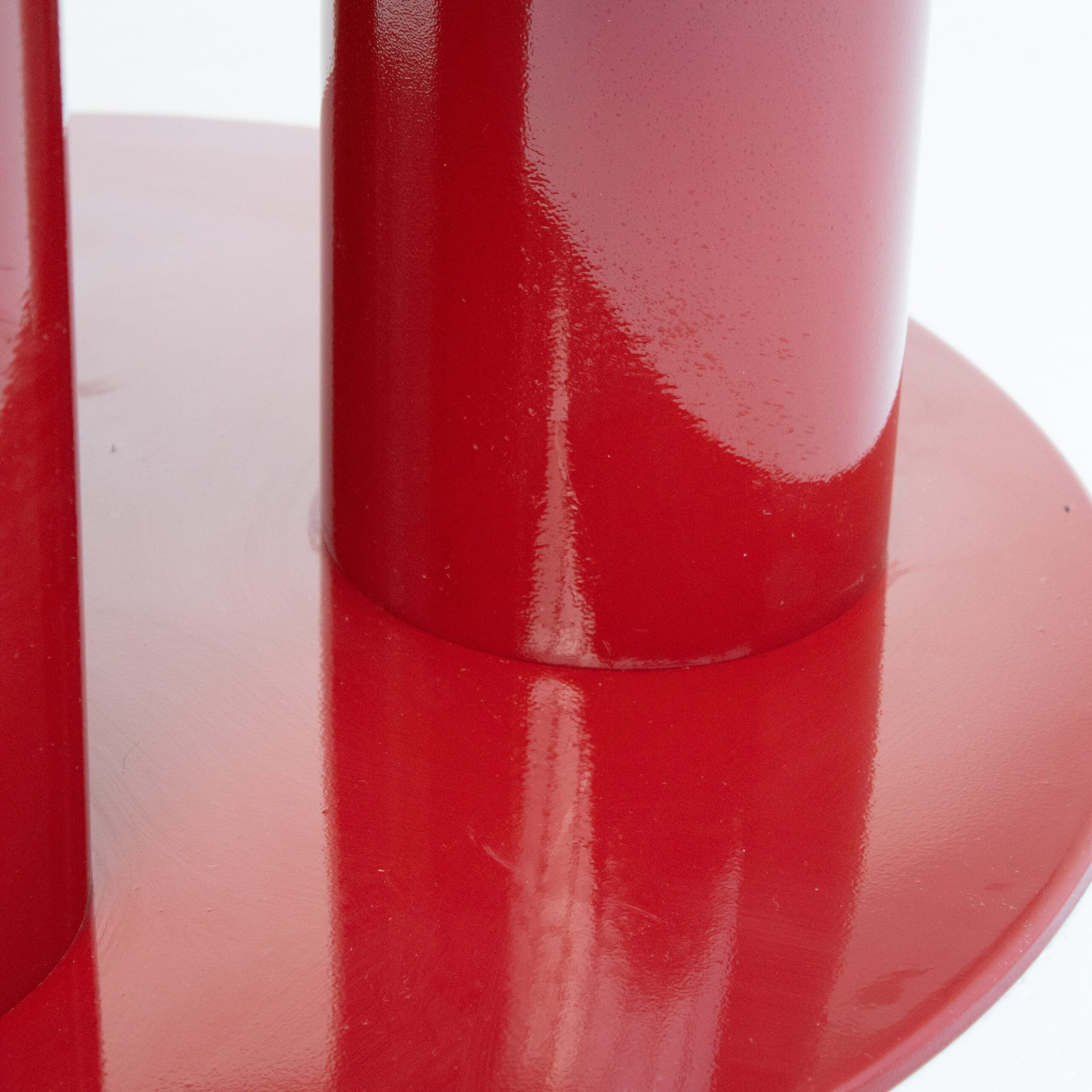 Round Marble Dining Table with Burgundy Lacquered Base — close-up of lacquered base detail