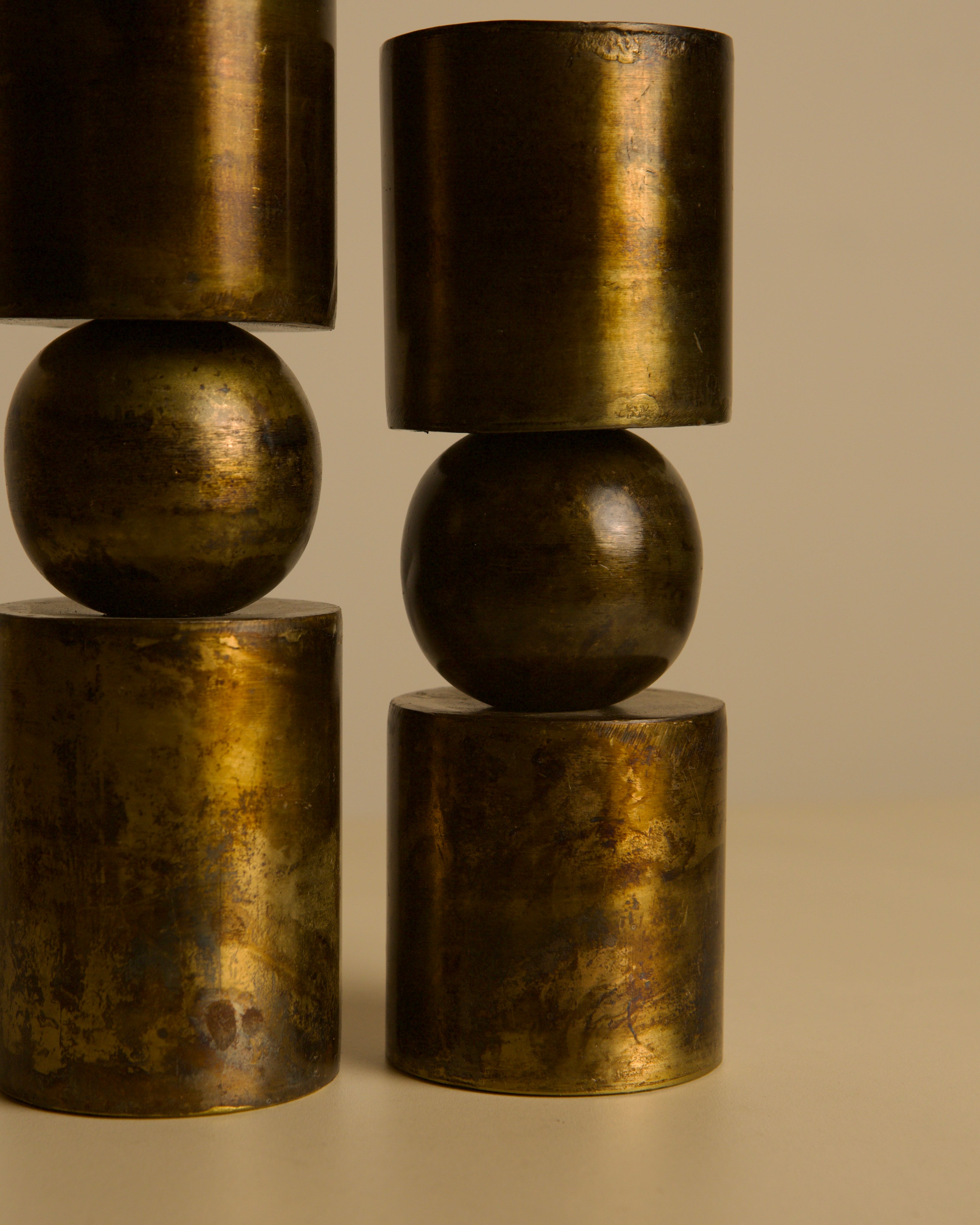 Pair of Danish copper-plated metal candlesticks from the 80s — lifestyle setting