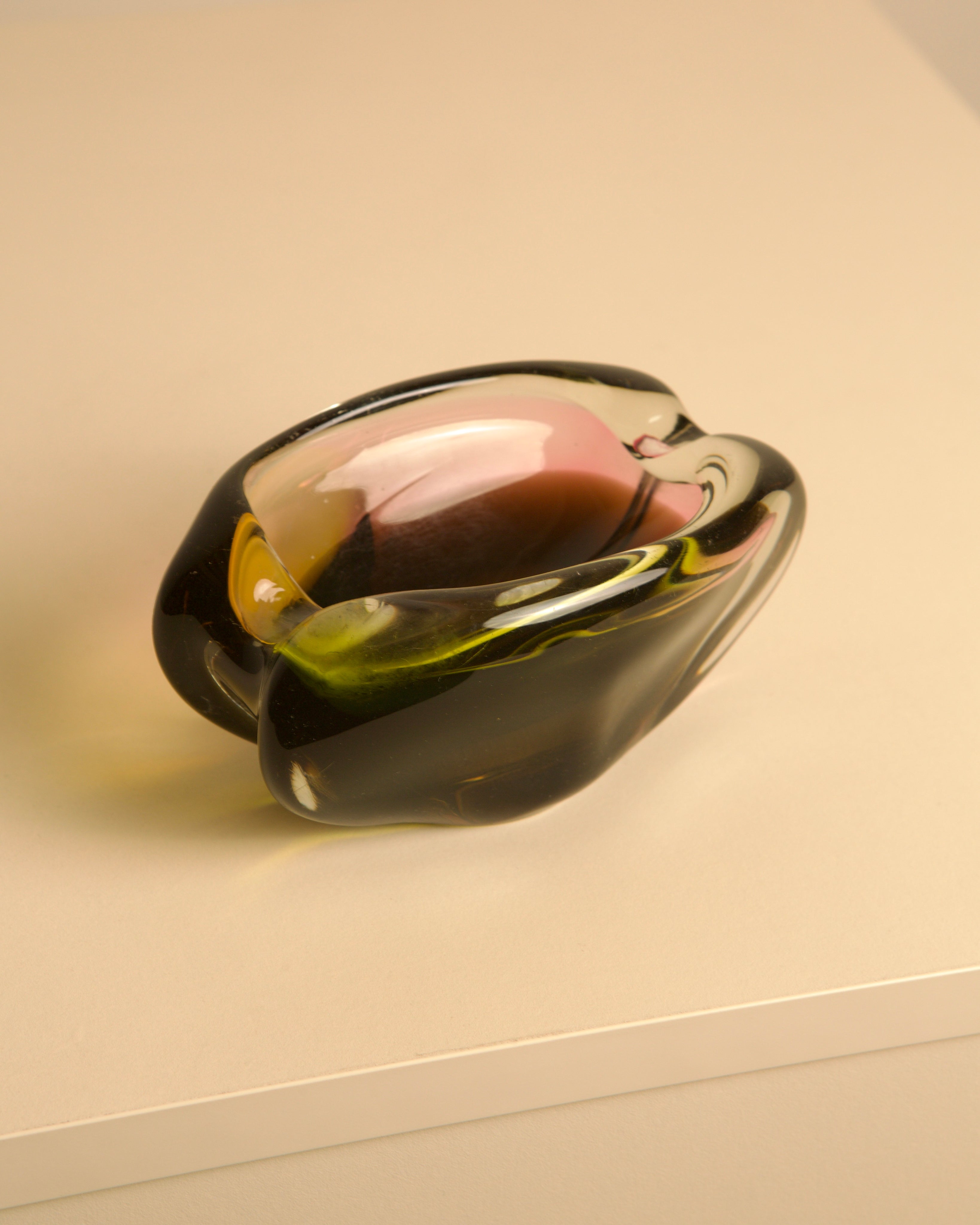Italian multicolored glass ashtray with curved organic form, 1970s