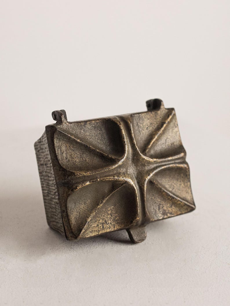 Vintage Brutalist Cast Bronze Trinket Box — angled view on neutral surface
