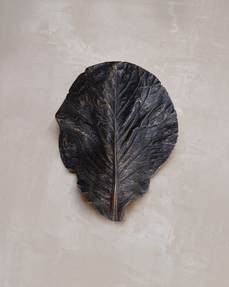 Bronze cabbage leaf wall light with textured veining detail