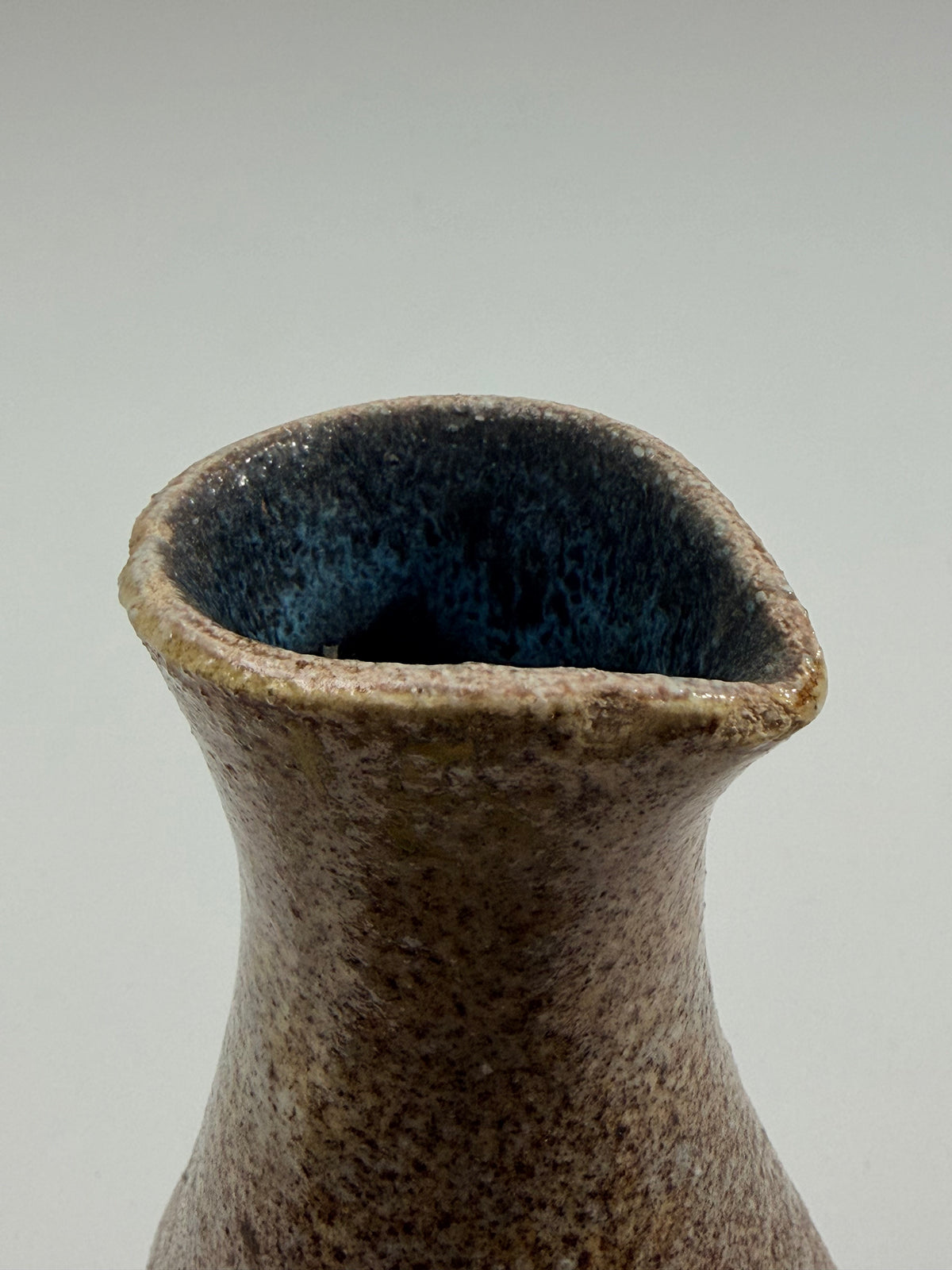 Ceramic pitcher with a pinched handle, Les Potiers d’Accolay, France, circa 1960 — lifestyle setting