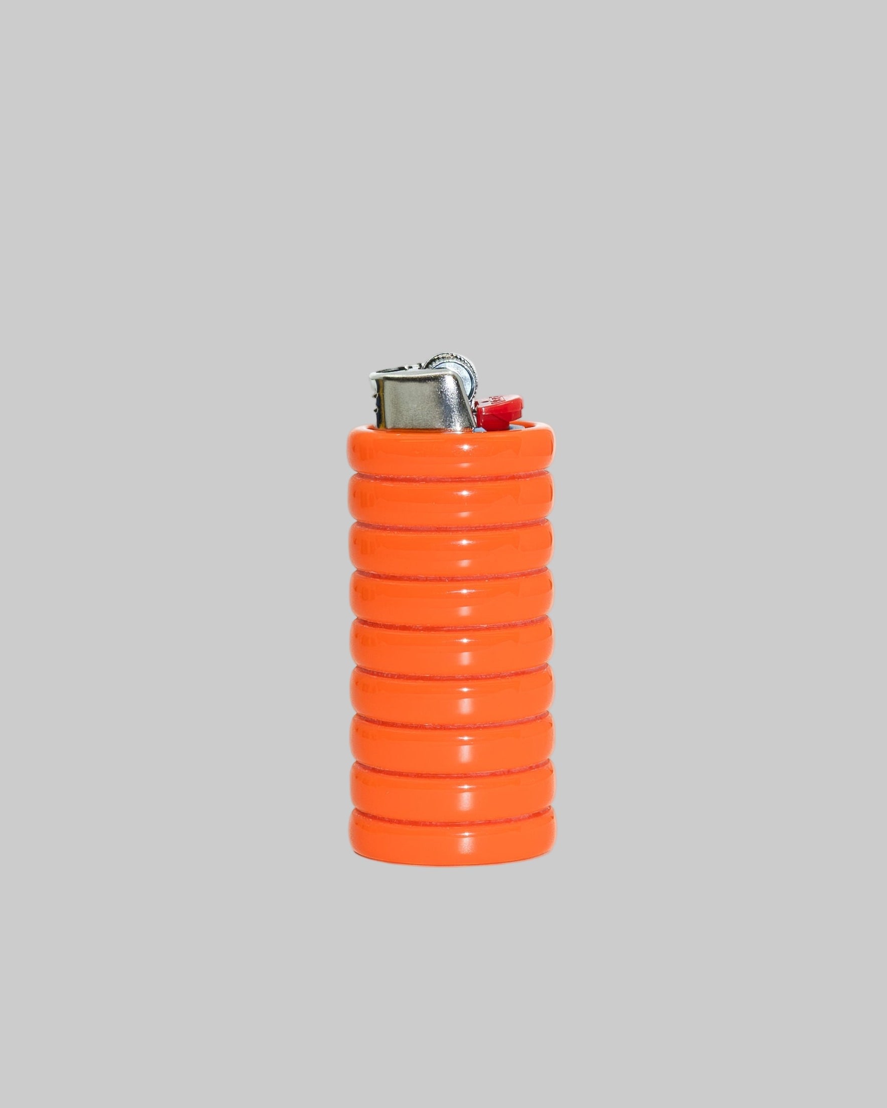 Gio Resin Lighter Holder — orange textured holder against gray background