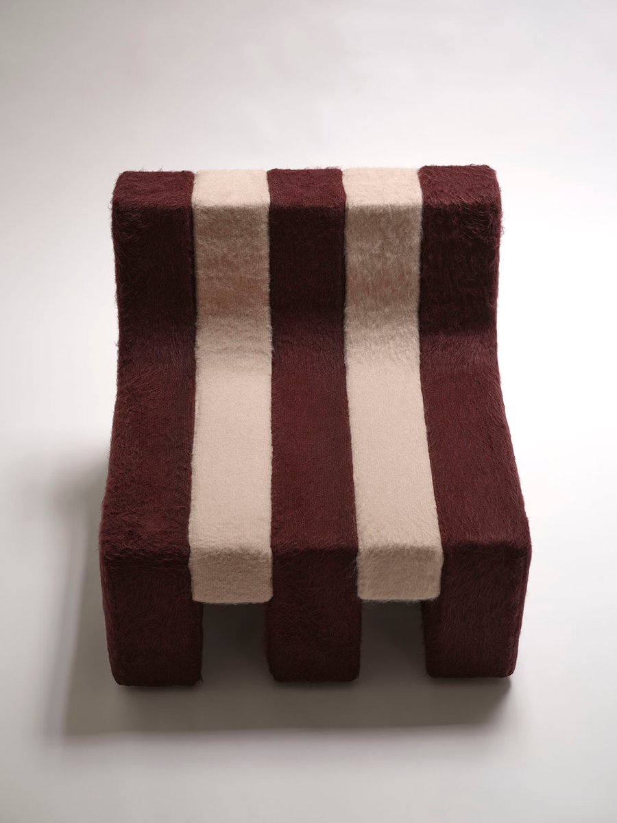 "One Plus" armchair — side angle