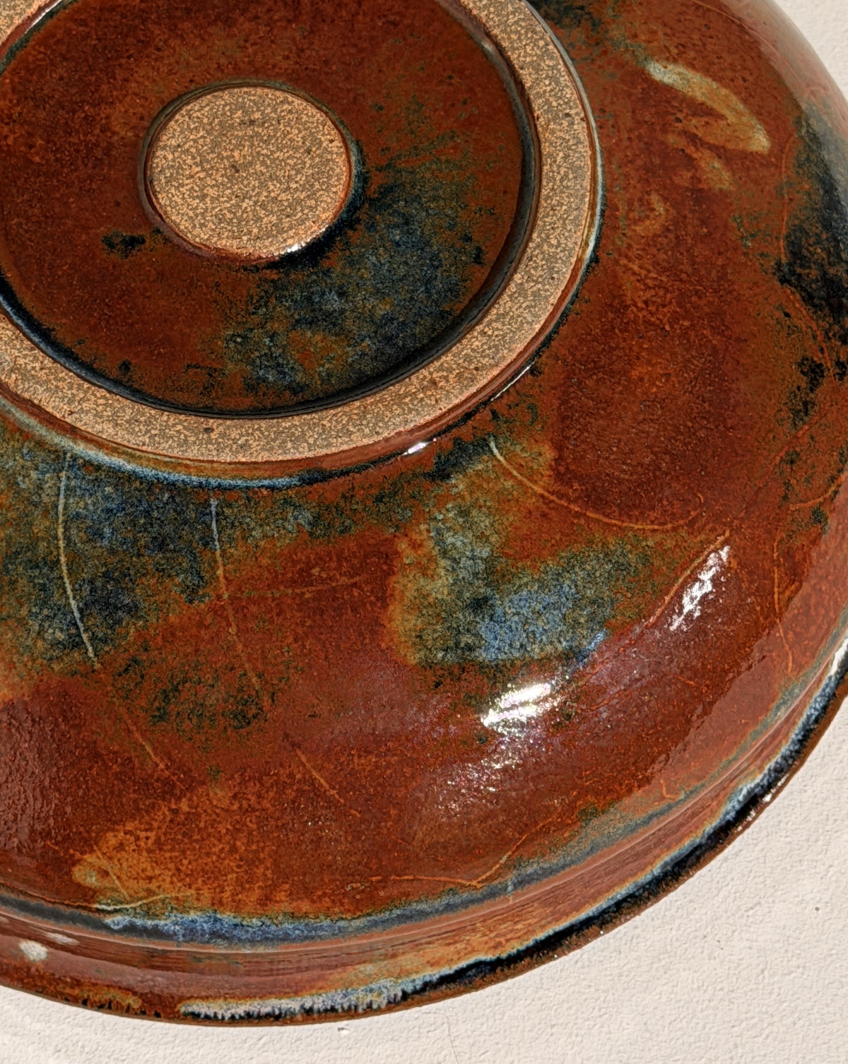 Ceramic dish by Elisabeth Wallet, circa 1960–1970 — side angle showing rich glaze colors