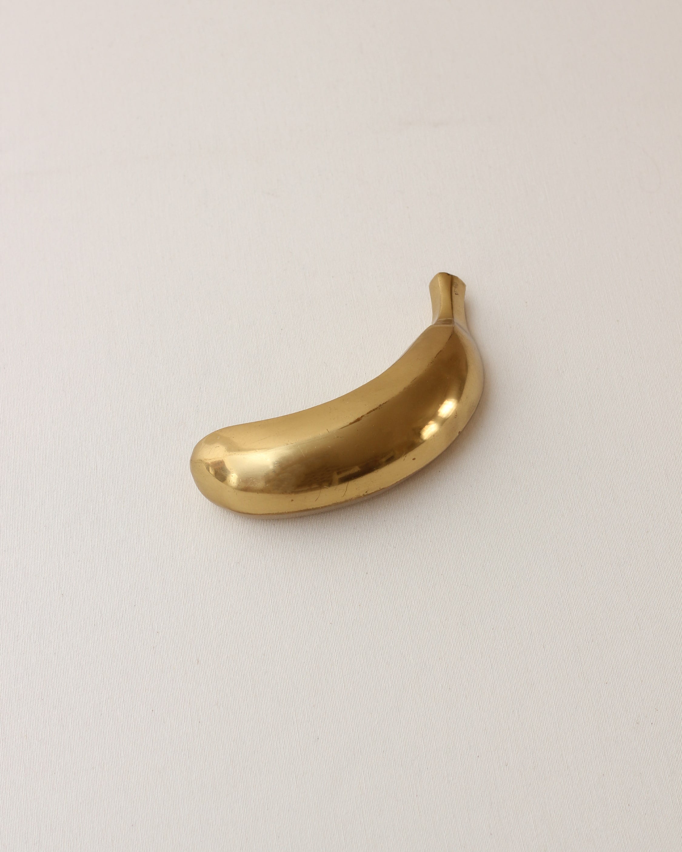 Bronze Banana Sculpture — side angle