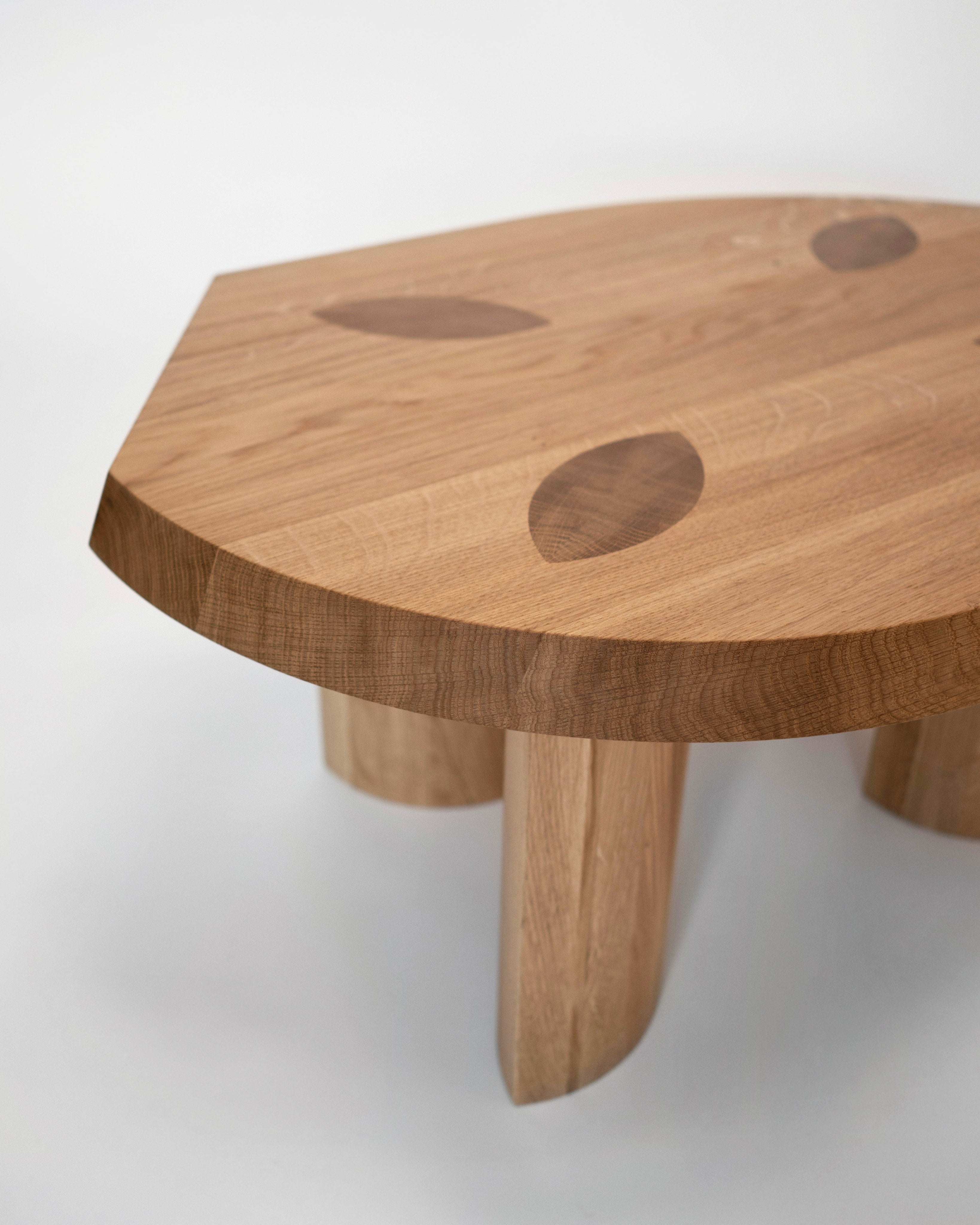 Gilbert Small Coffee Table - Oak — angled view of wooden tabletop with inlays