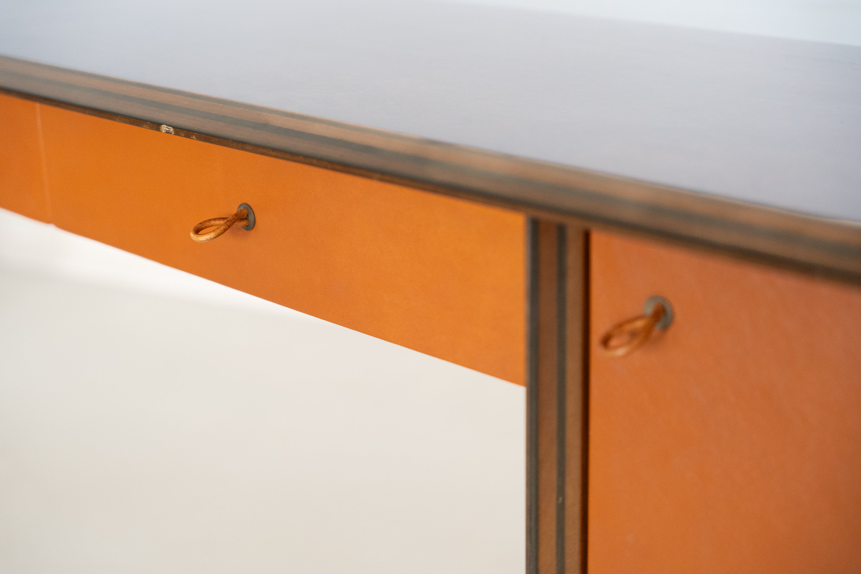 Artona Console by Afra & Tobia Scarpa for Maxalto — close-up of orange cabinet drawer detail