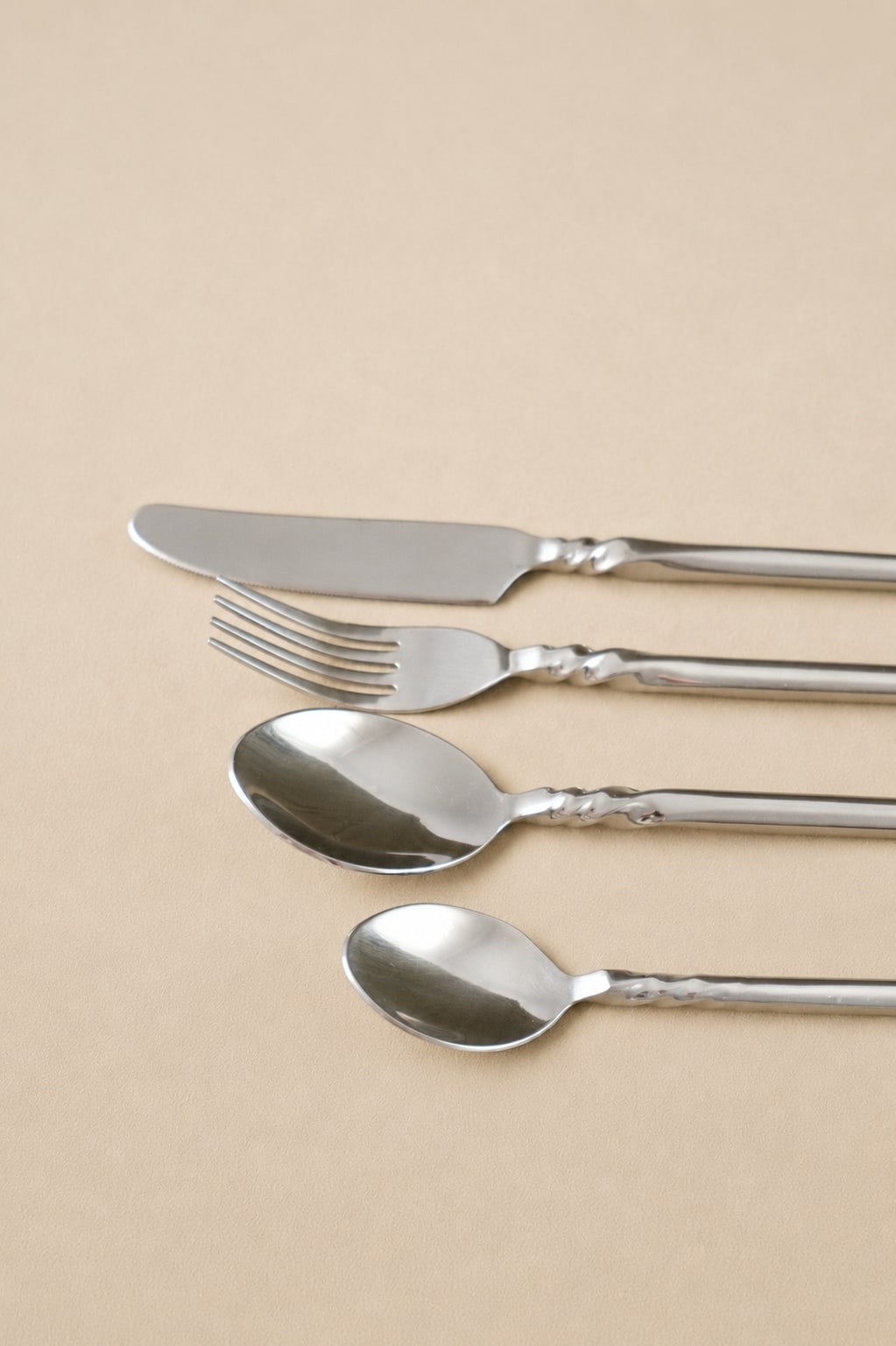 Set of 24-Piece Stainless Steel Cutlery — side angle