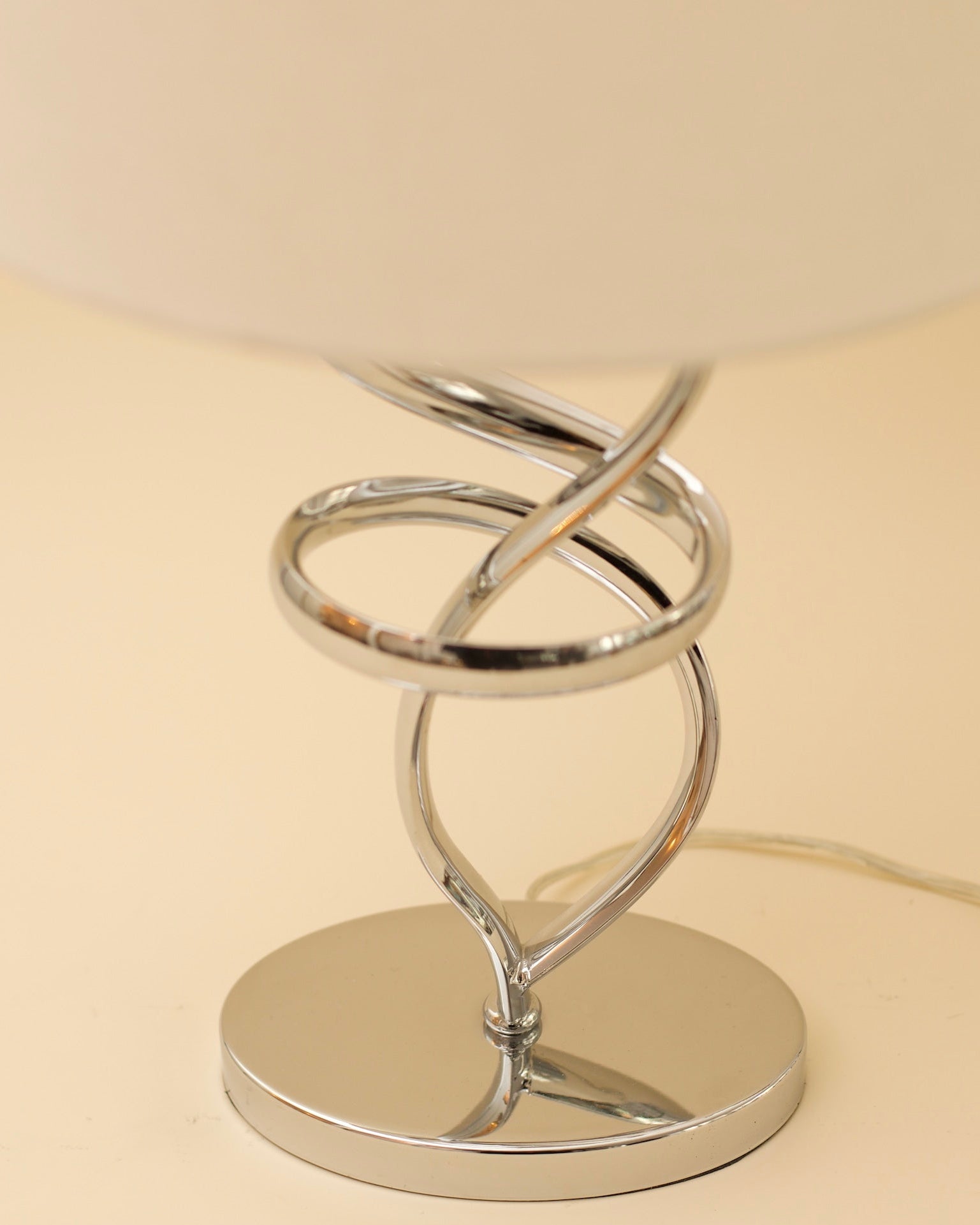 MIES Table Lamp — close-up of chrome spiral base