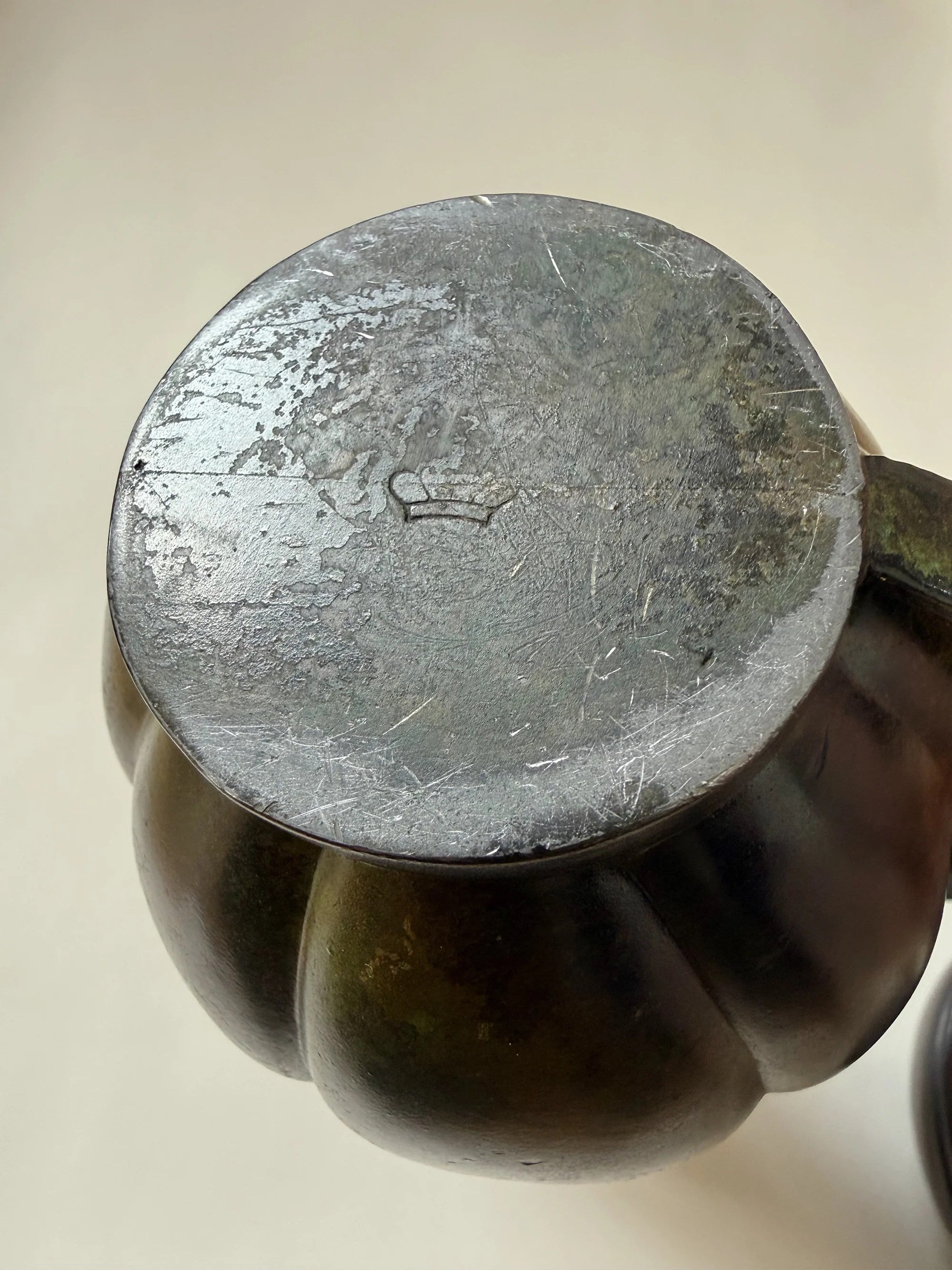 Danish Bronze Vase with Ribbed Form, 1910s — top view of bronze base texture