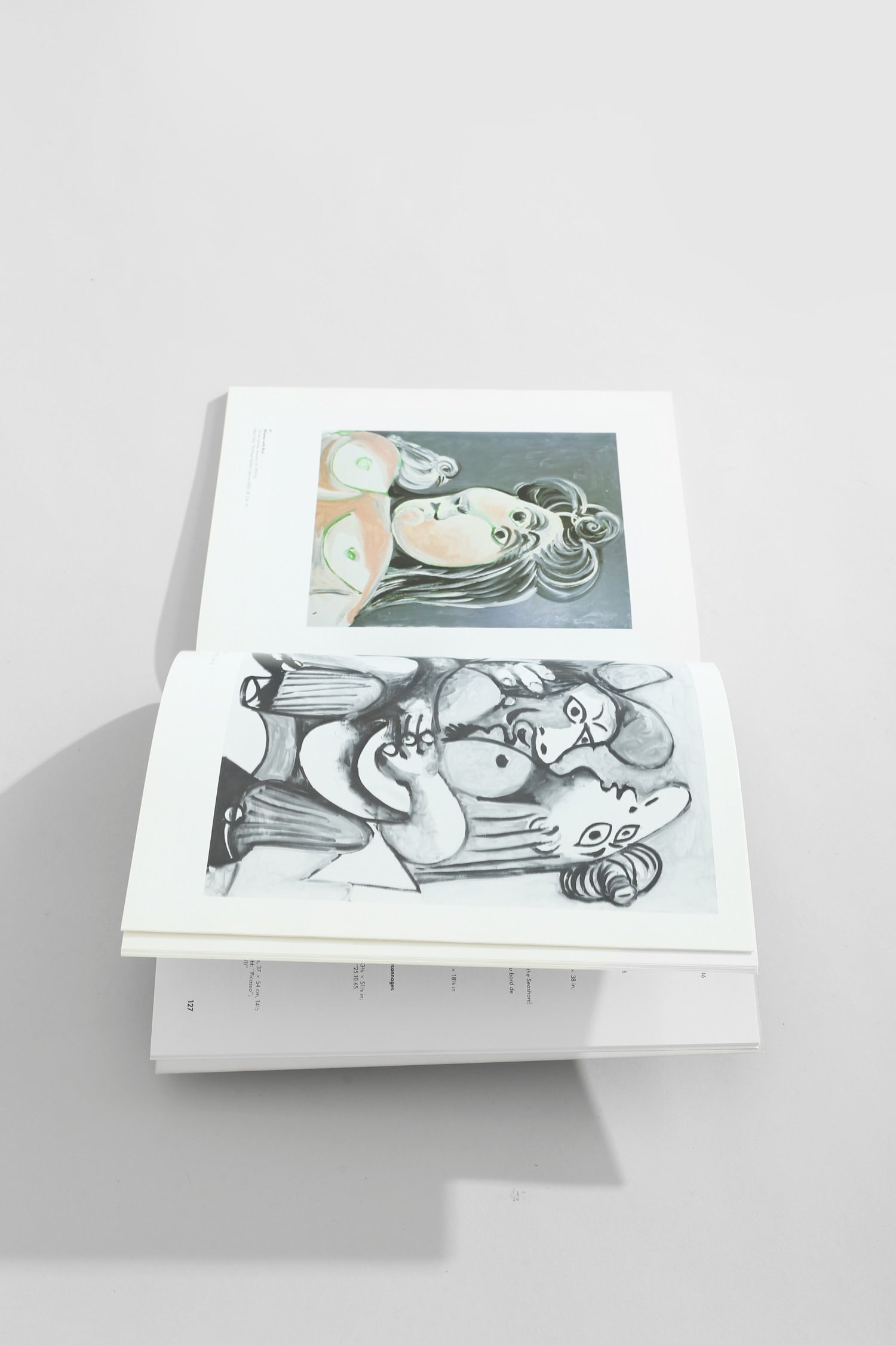 Picasso, The Last Years Book — top view of open pages on white background