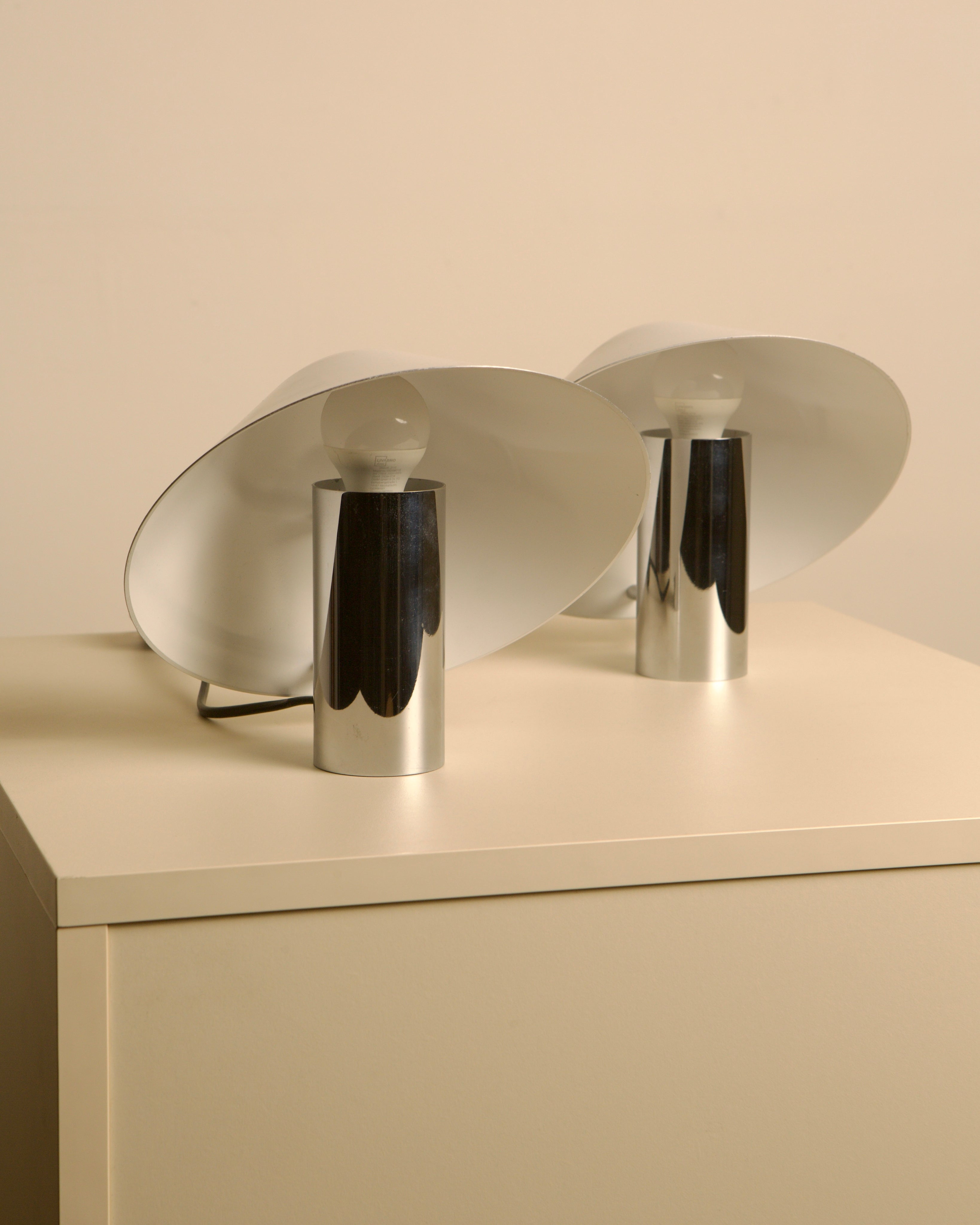 Pair of Pulcino chrome table lamps with translucent shades by Mazza