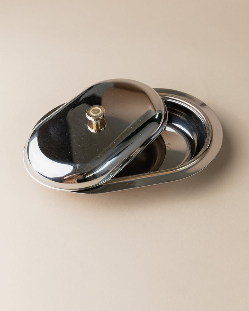 Stainless Steel Butter Dish, Italy 1970s — close-up of polished surface and handle