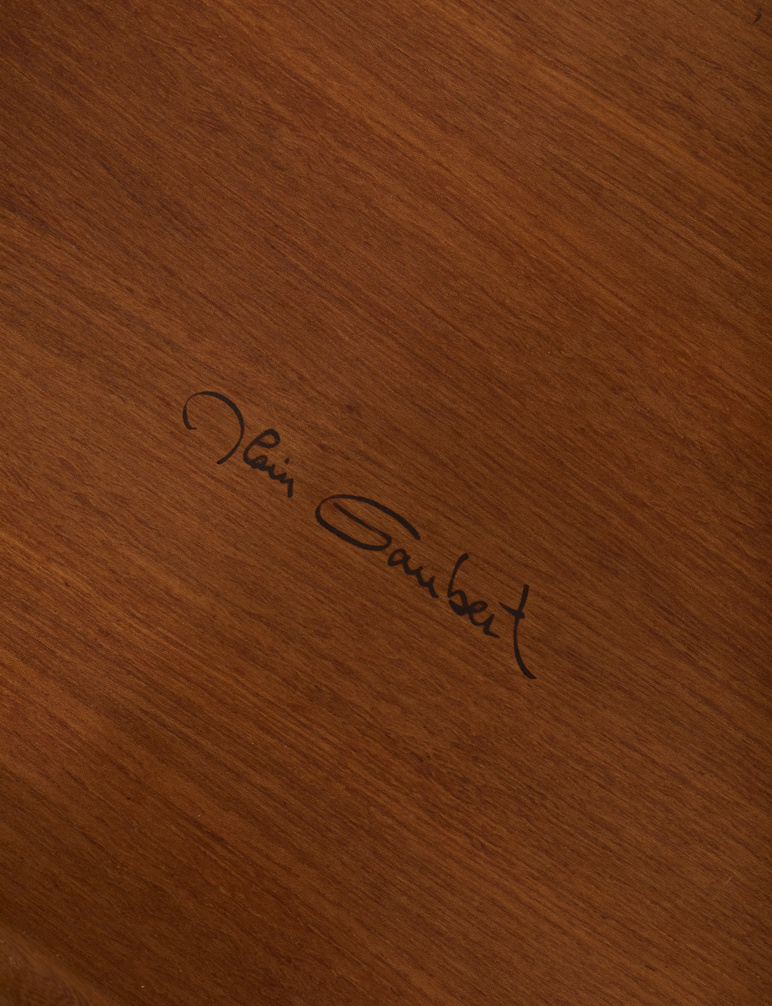 Small dismountable wooden meditation table by Alain Gaubert, France circa 1980 — close-up of signature on wooden surface