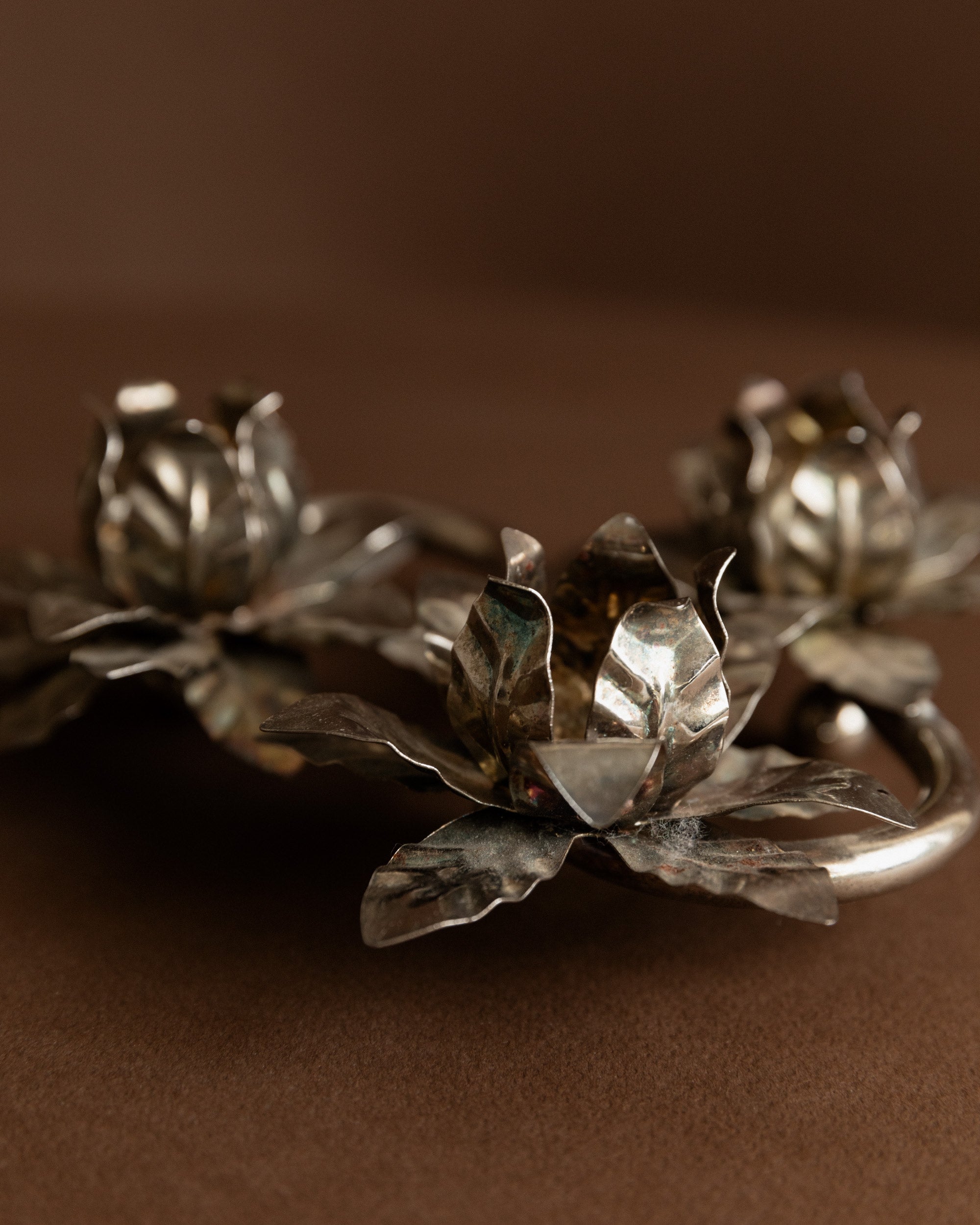 Silver Plated Vintage Candleholders — back view highlighting floral design and texture