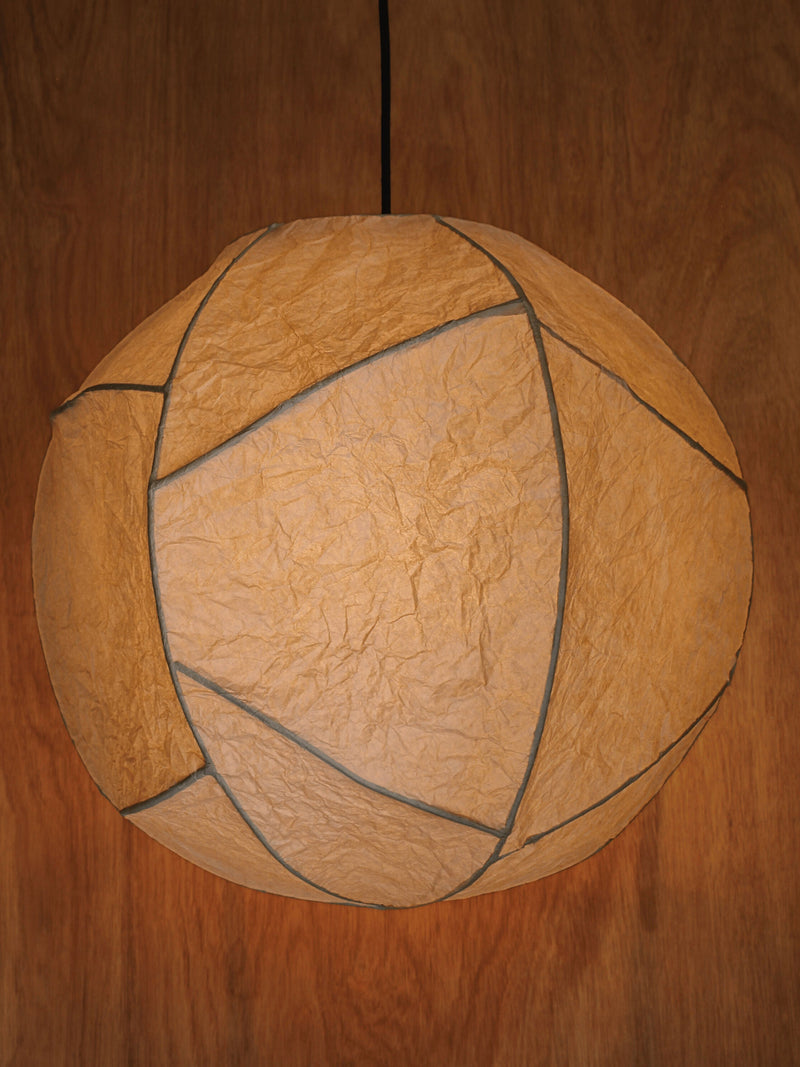 Sol' Pendant Light — close-up of textured paper shade with black trim