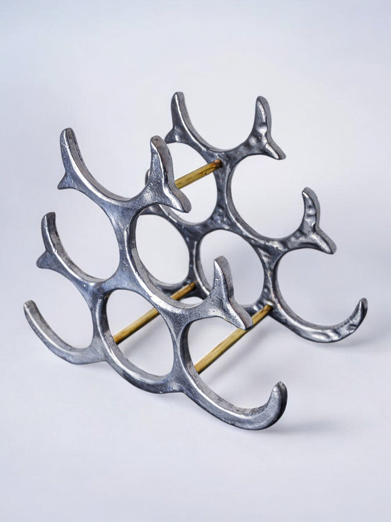 Brutalist bottle rack by Art3, Spain, 1980s — close-up of metallic structure with brass accents