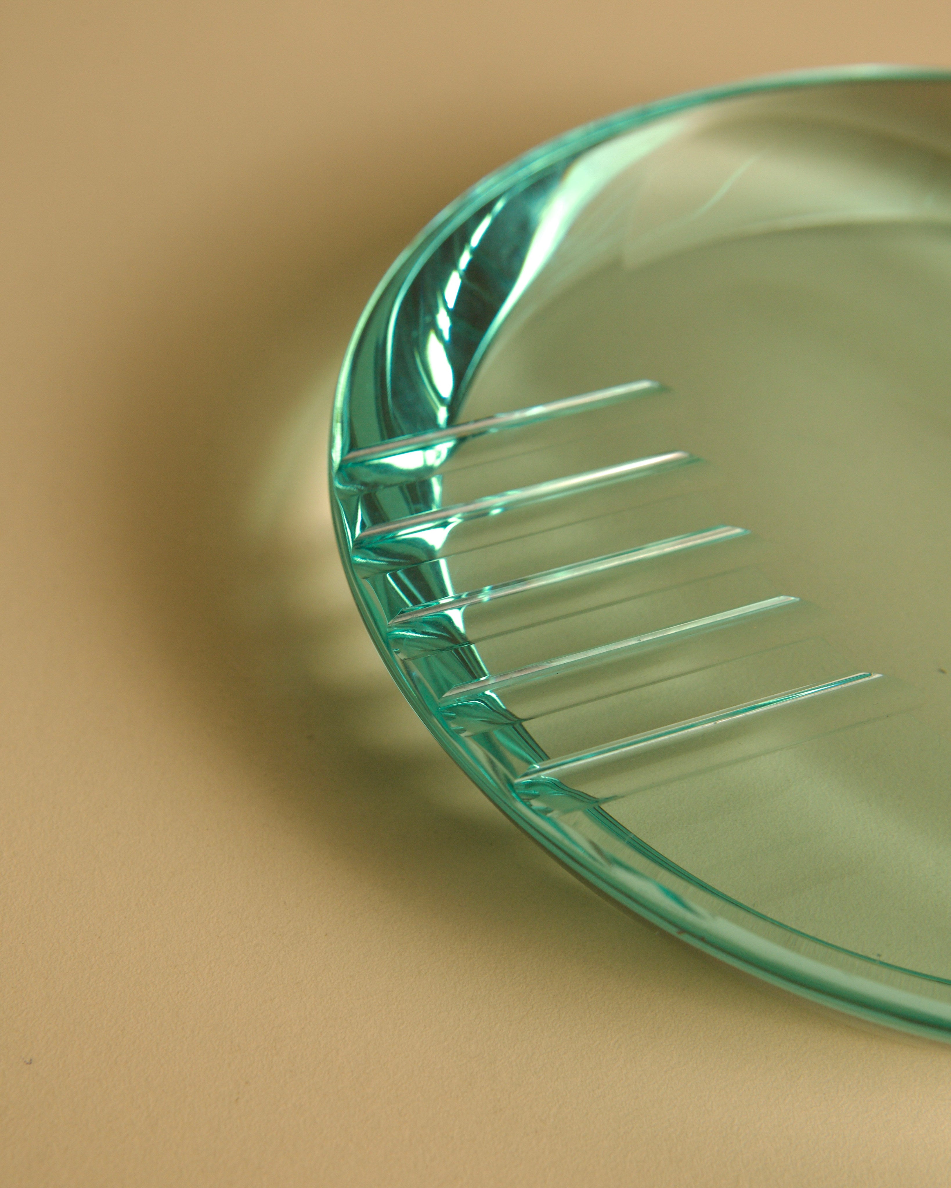 Round Italian Glass Ashtray by Fontana Arte, 1970s — close-up showing textured glass surface