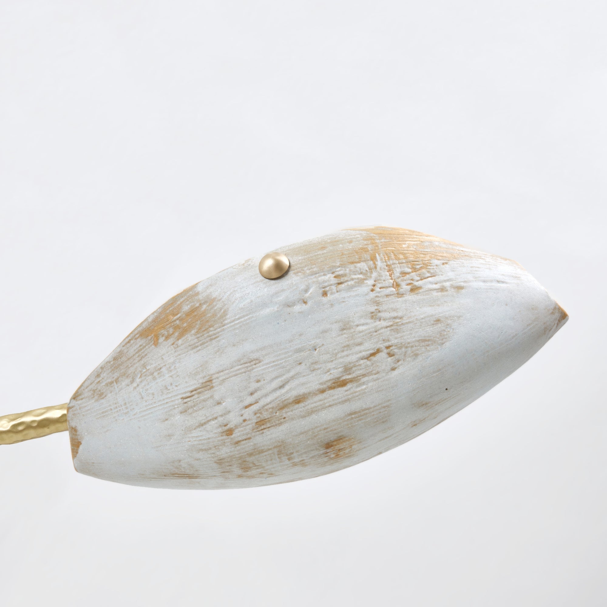 Serrallés Chandelier — top view of textured white and gold pendant