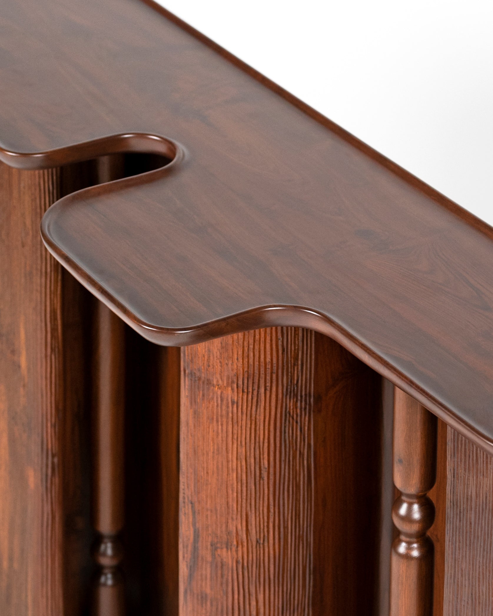 Ridge Console Table — back view highlighting curved wooden top