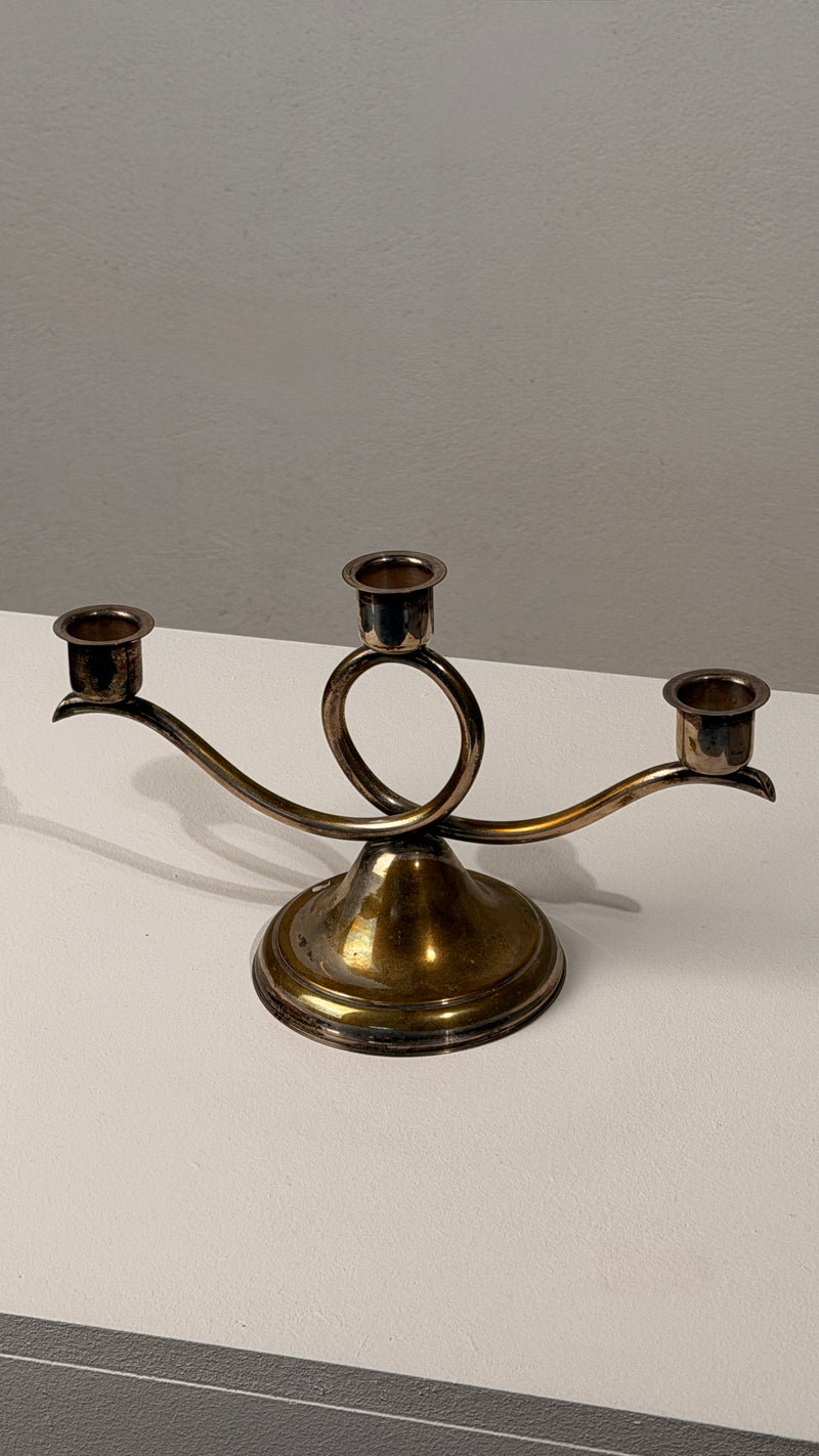 Silvered Metal Candelabra, France, 20th Century — close-up of three candle holders on a flat surface