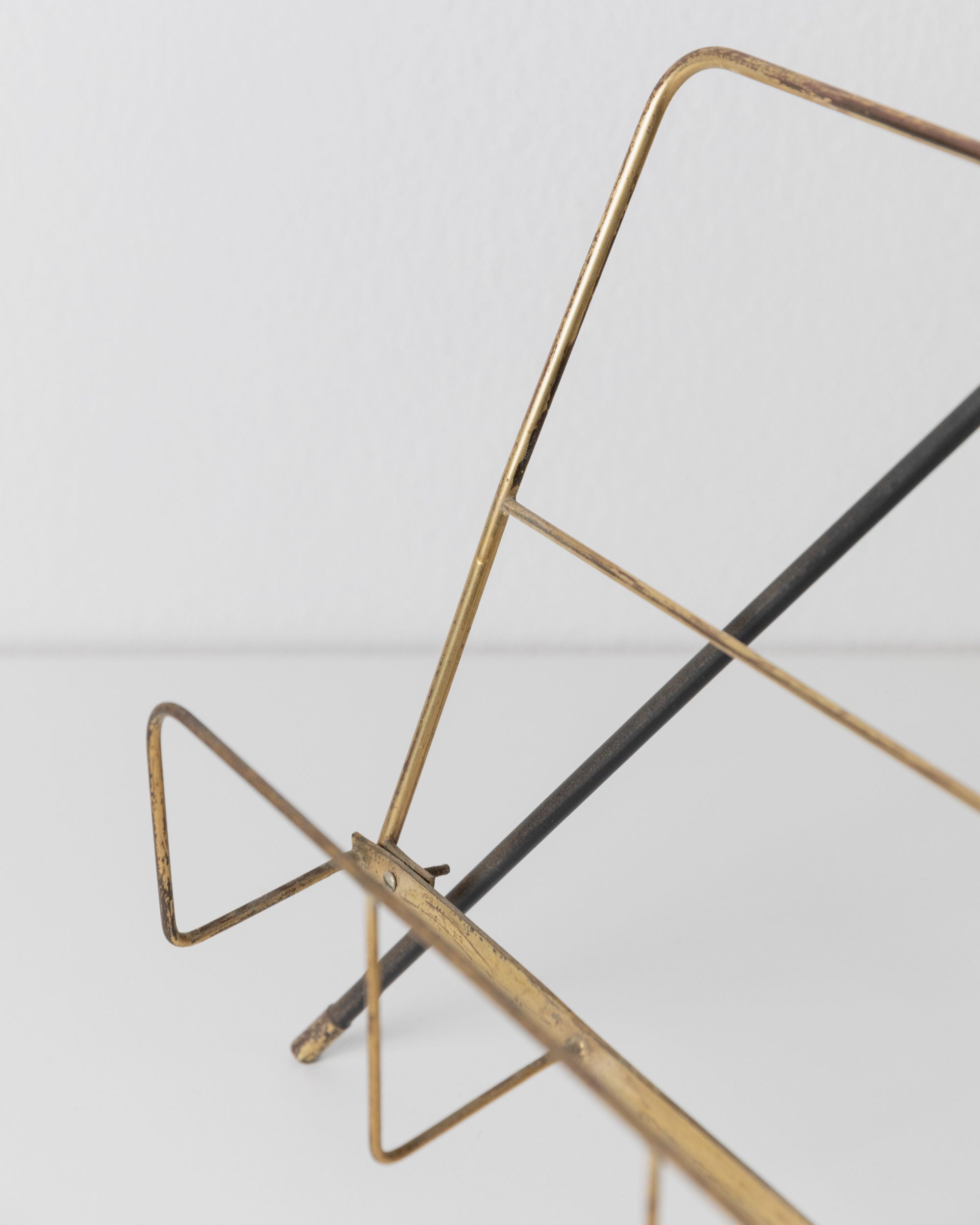 Brass Magazine Rack and Ashtray 1960s — angled view highlighting brass frame details