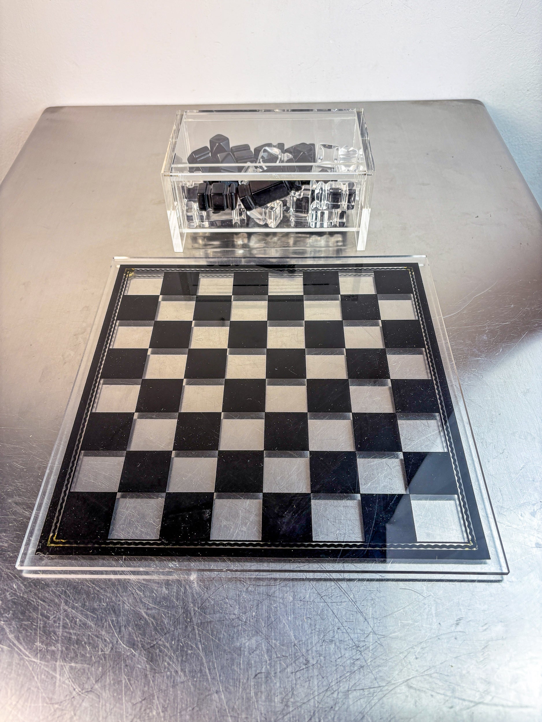 Felice Antonio Botta Acrylic Chessboard, Italy, 70s — back view on metallic surface