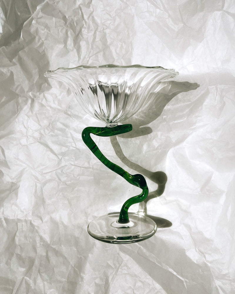 Crystal ice cup with green spiral vine stem on clear base