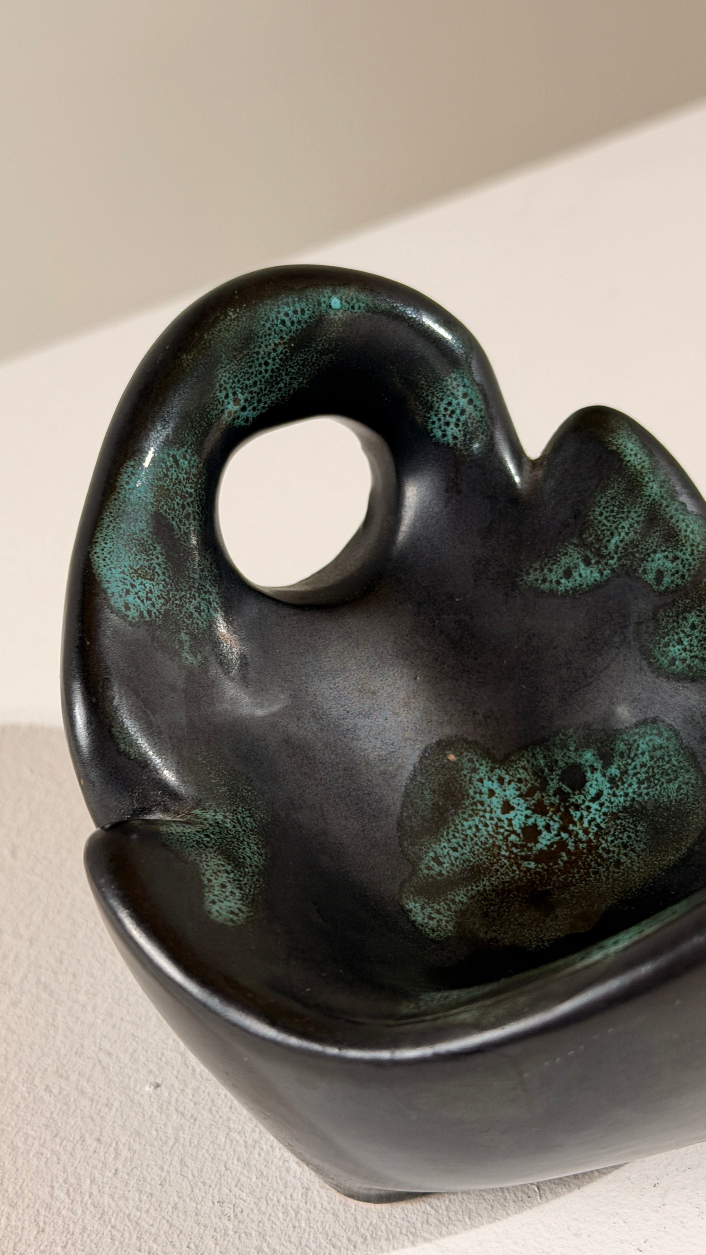 Free-form Ceramic Bowl, Vallauris, France, circa 1960 — top view highlighting dark ceramic with turquoise accents