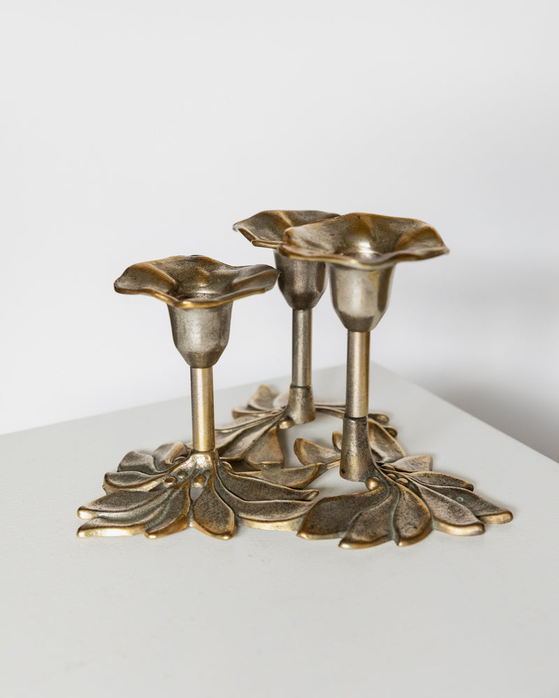 Bronze Art Nouveau candleholder with three flower-shaped holders