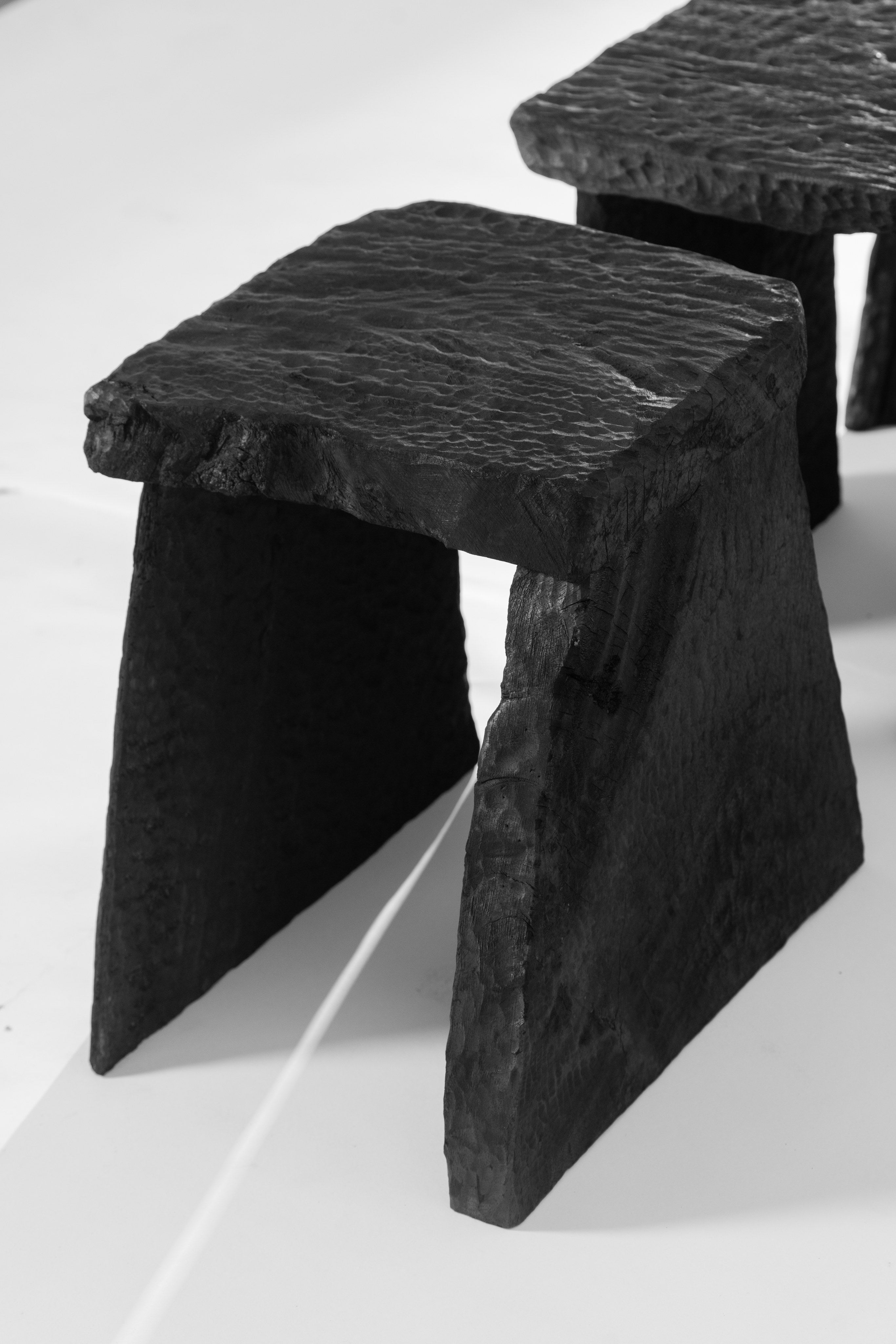 Massif Carved Stool in Eucalyptus Wood — lifestyle setting