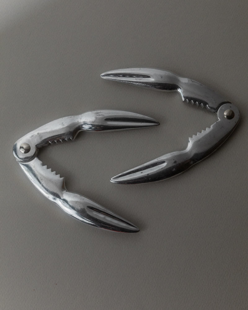 1960s Silver Plated Lobster Cracker, Set of 2 — close-up on polished silver surface