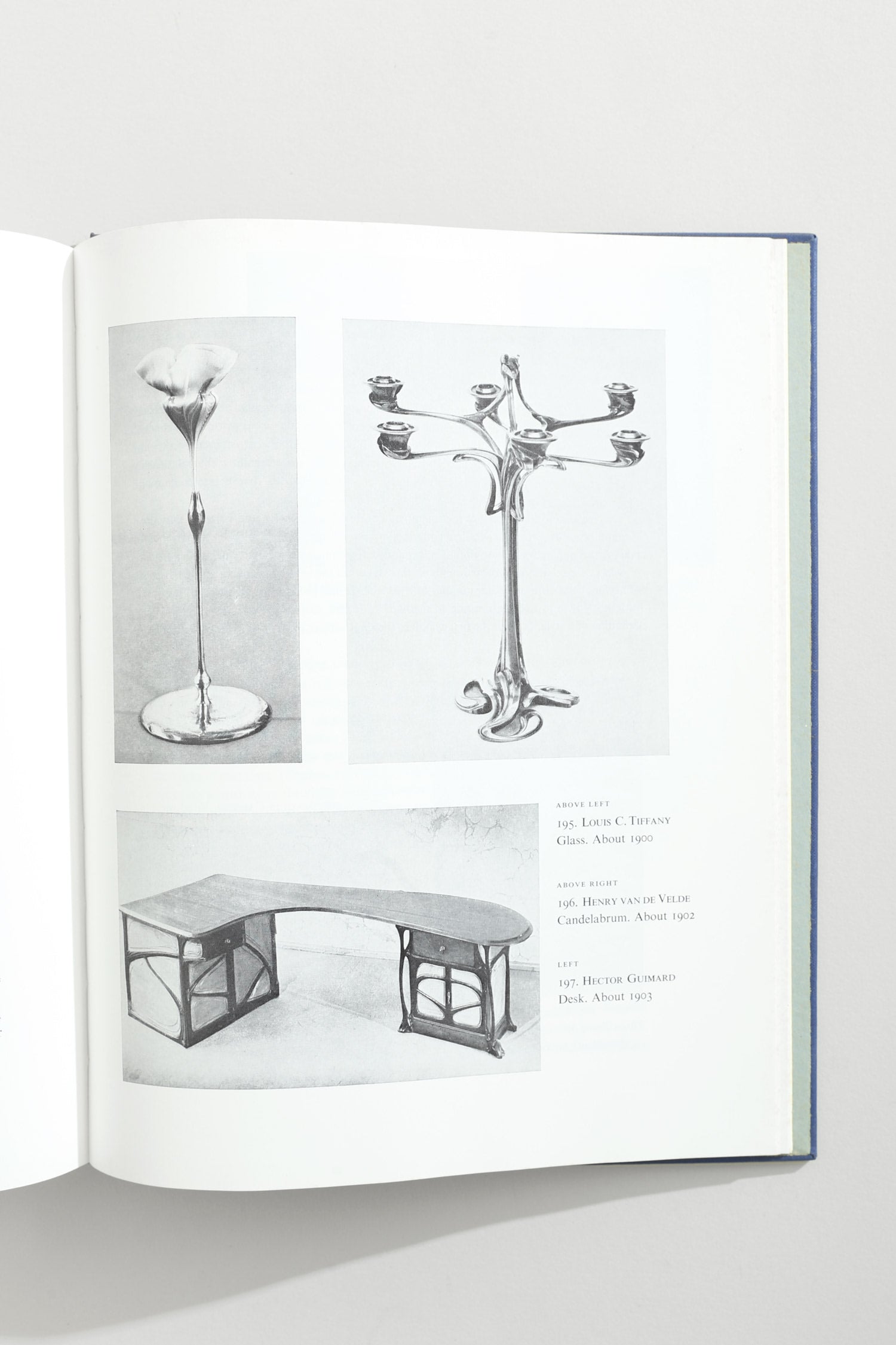The Visual Experience Book — top view of open pages showing black and white images