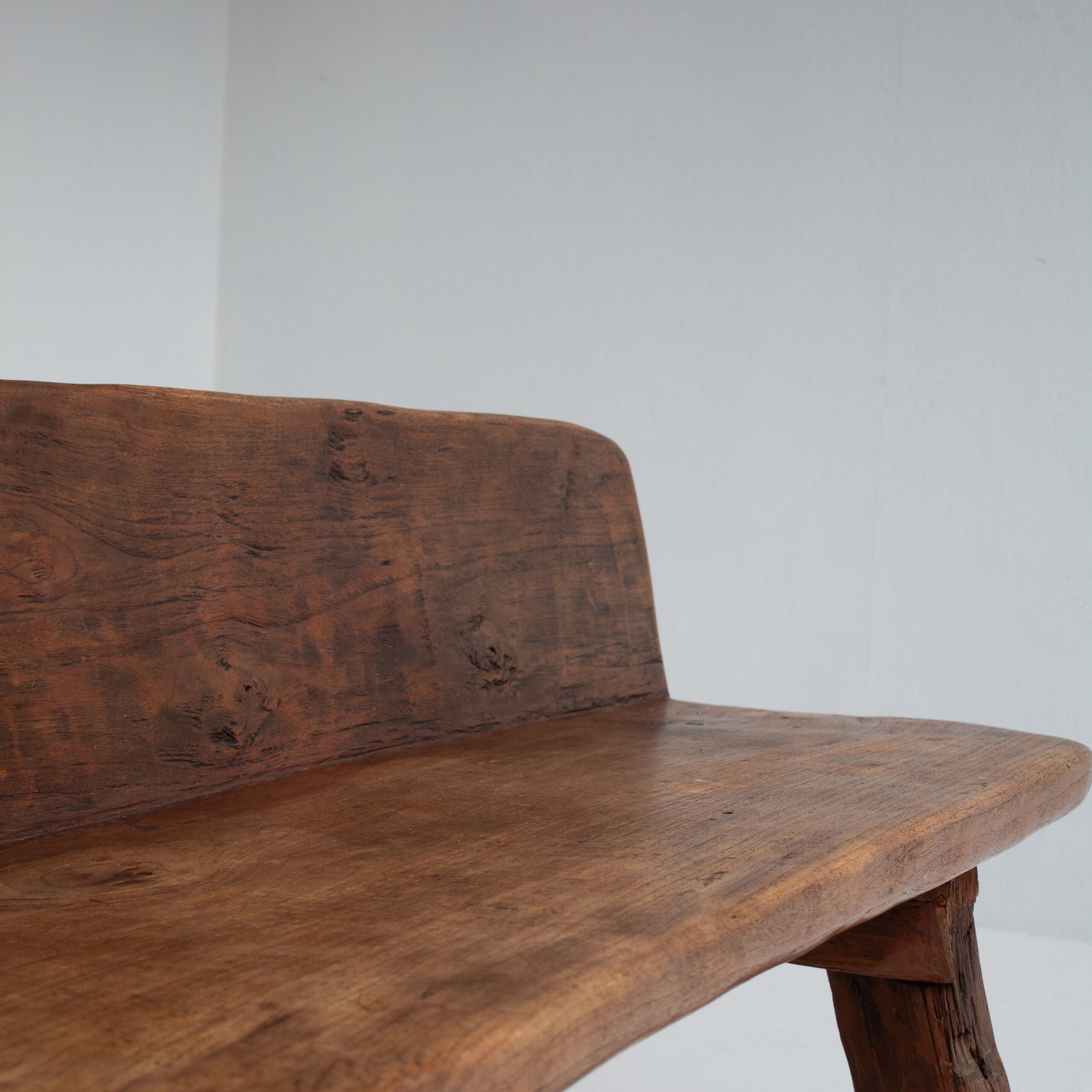 Rustic Wooden Bench — close-up of handcrafted wooden seat texture