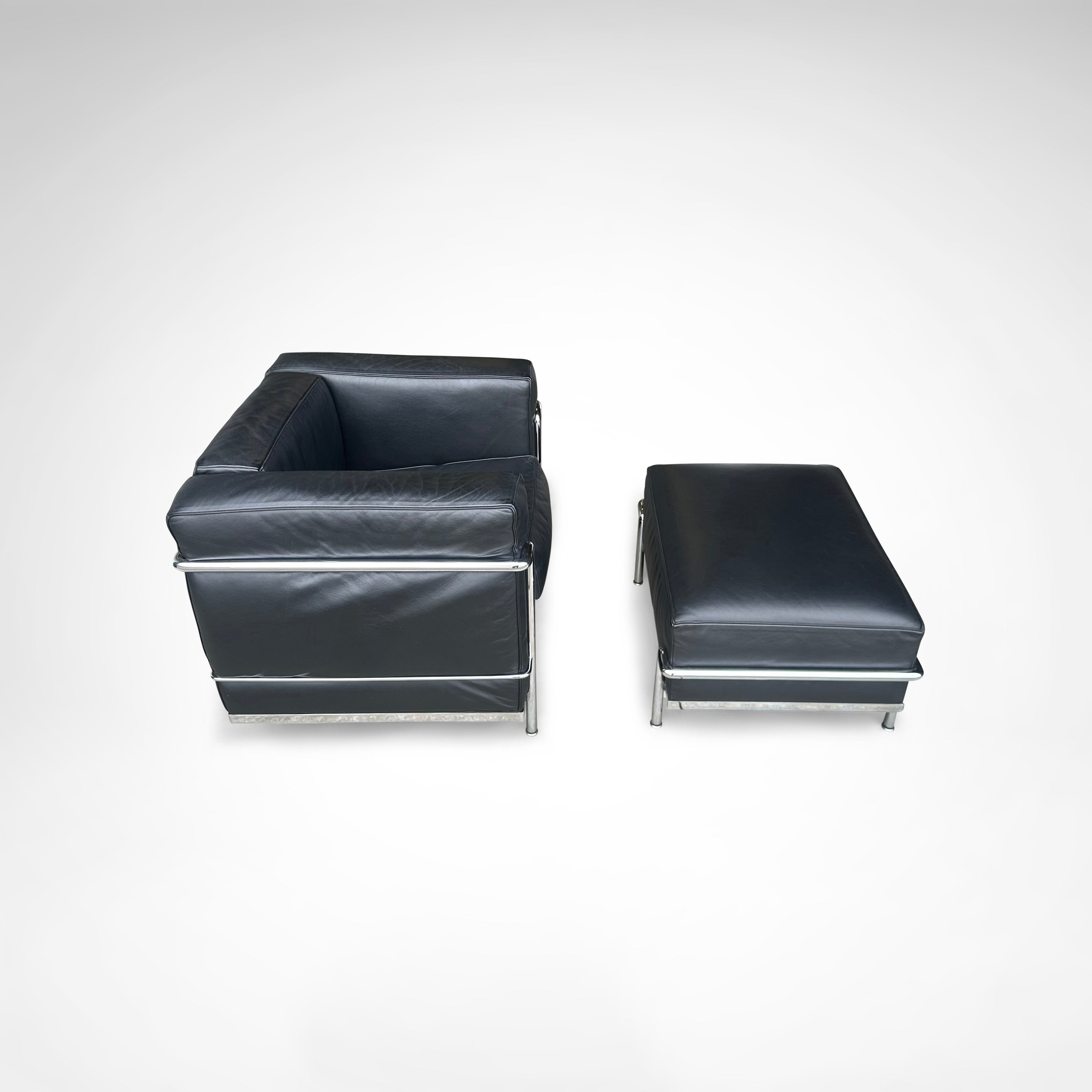 LC2 Armchair and Ottoman by Le Corbusier et al. for Cassina 1990s — side angle showing black leather upholstery and chrome fr